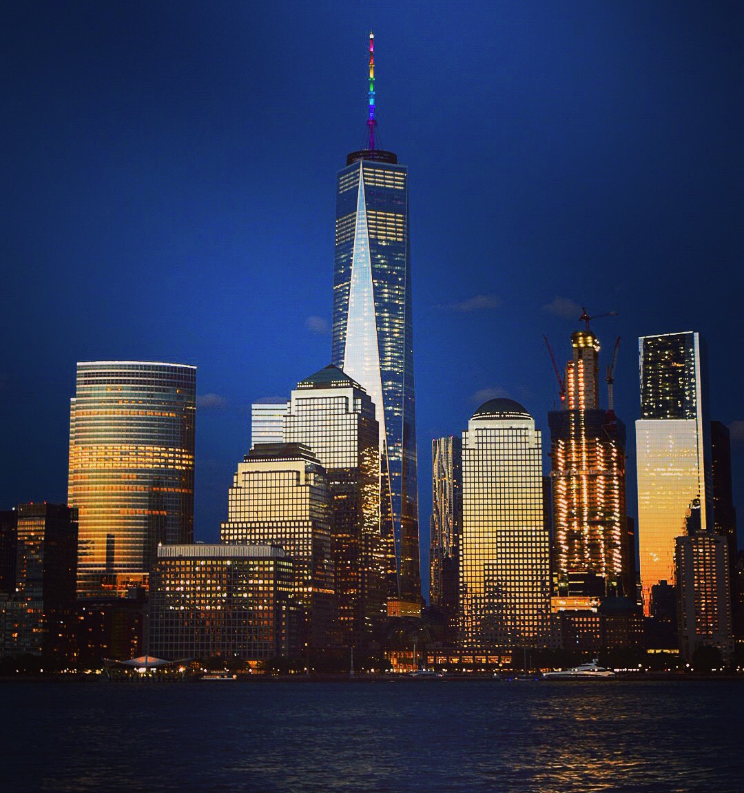 The spire of One World Trade Center lights up in the colors of the rainbow on June 12, 2016 to remember victims of the mass shooting at a gay nightclub in Orlando.  