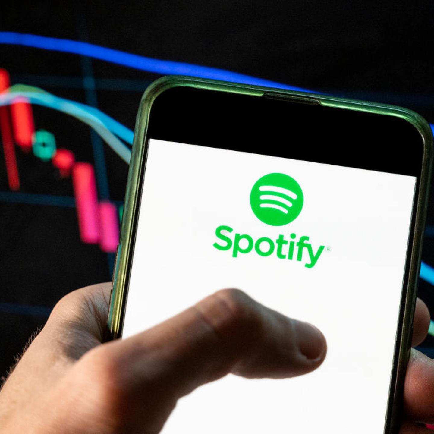 In this photo illustration, the logo of Spotify, a Swedish