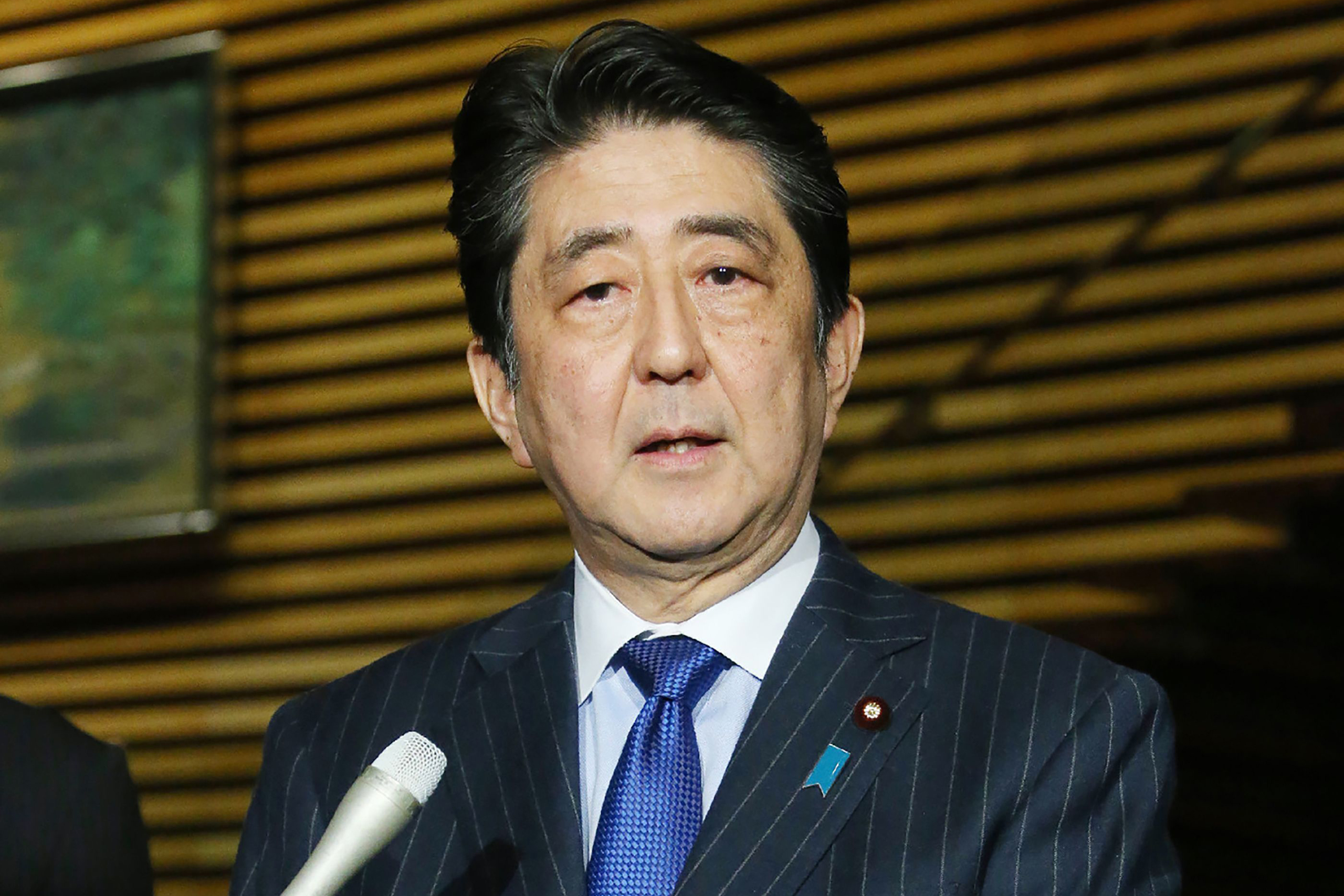 Japan's Prime Minister Shinzo Abe speaks to reporters at his official residence in Tokyo on Dec. 5, 2016.
