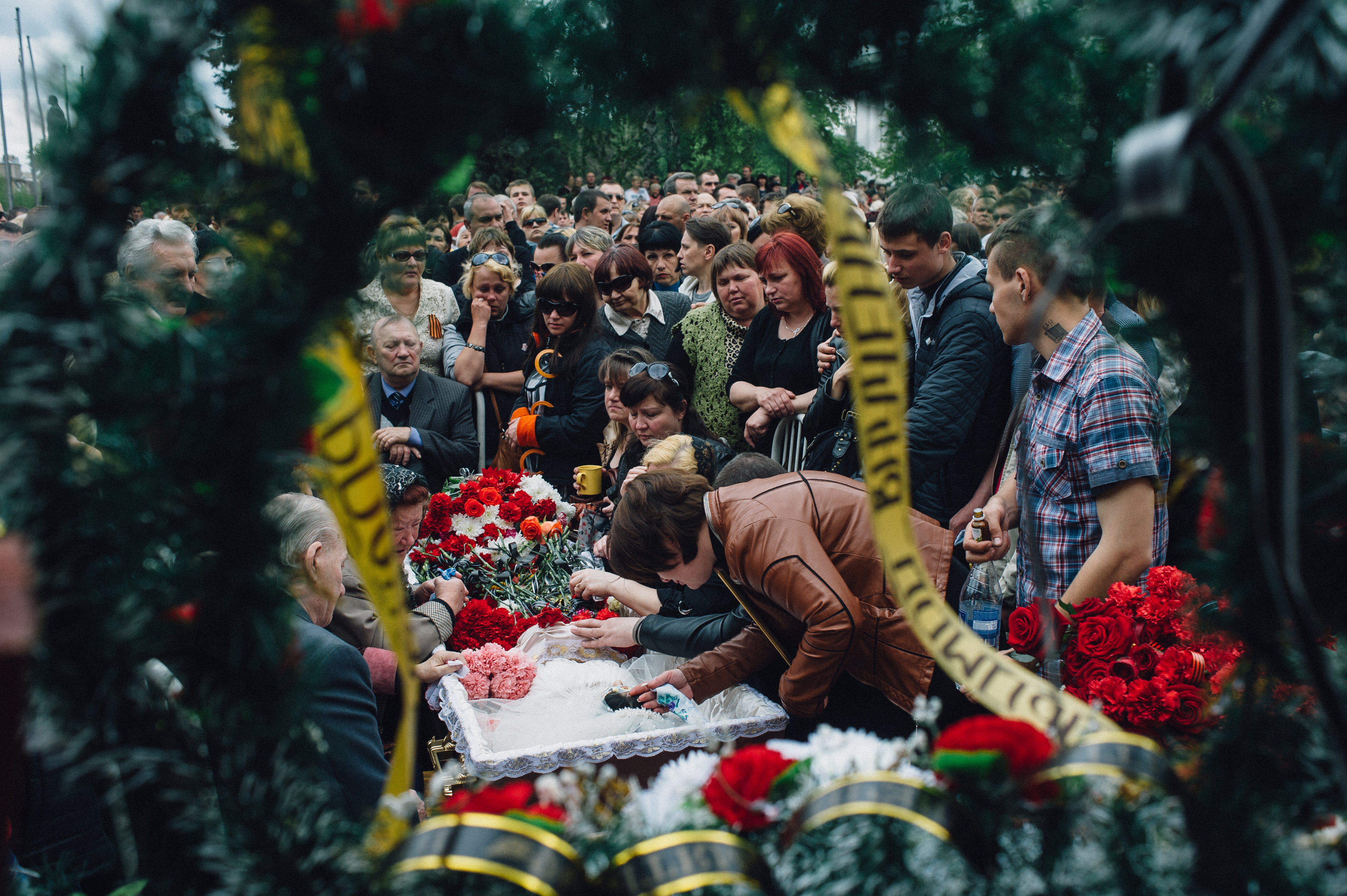 Kramatorsk, Ukraine. May 5, 2014. A funeral of a young girl age 21, Yulia Izotova in the central square in Kramatorsk. Witnesses say she was killed by shots from a Ukrainian military column on the road from Slaviansk to Kramatorsk, Kramatorsk, Maxim Dond