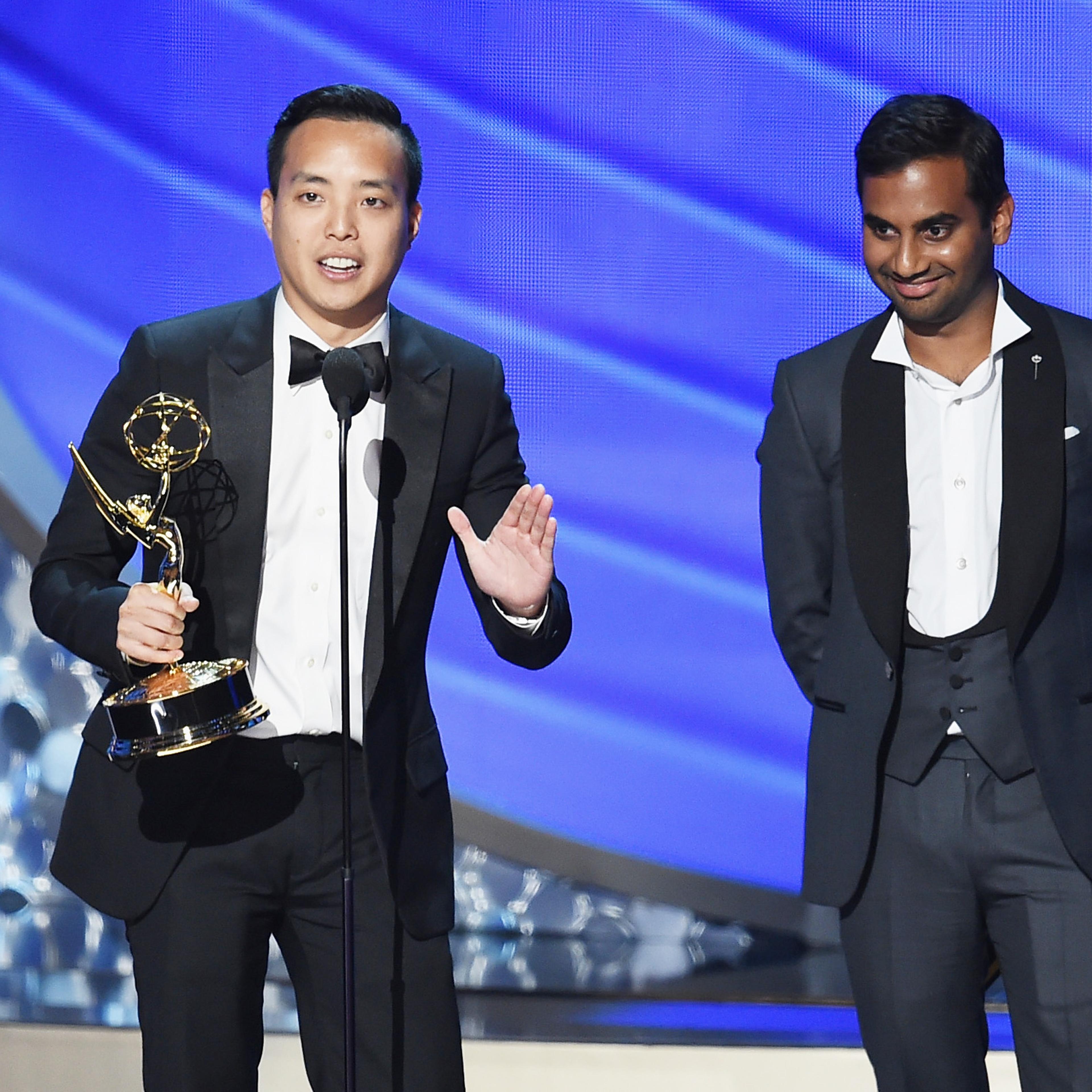 Alan Yang and Aziz Ansari accept Outstanding Writing for a Comedy Series for the Master of None episode "Parents" during the 68th Annual Primetime Emmy Awards on Sept. 18, 2016 in Los Angeles.