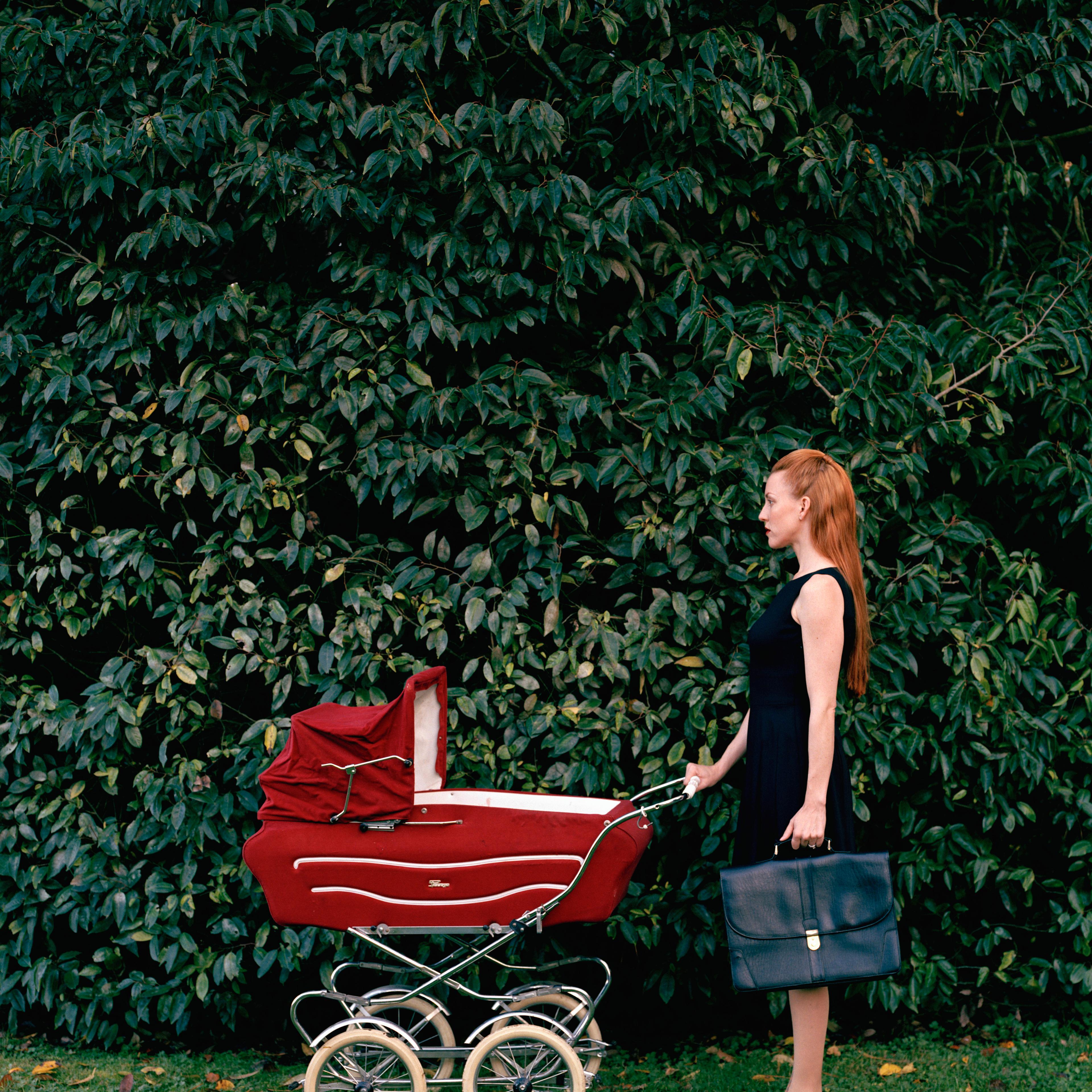 businesswoman-briefcase-baby-stroller