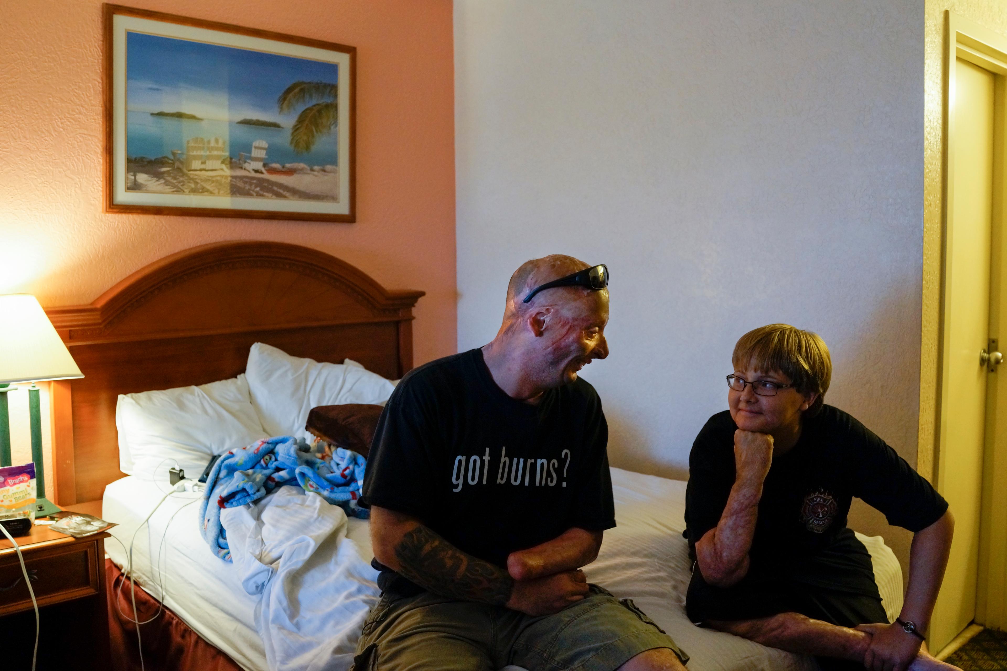 2013. Galveston, TX. USA. Bobby tells jokes to Grant, a 12-year old who was burned as a toddler and was about to undergo his 37th surgery. Bobby went to visit him to cheer him up. Bobby says "Most humans will never understand what it's like to be burnt.
