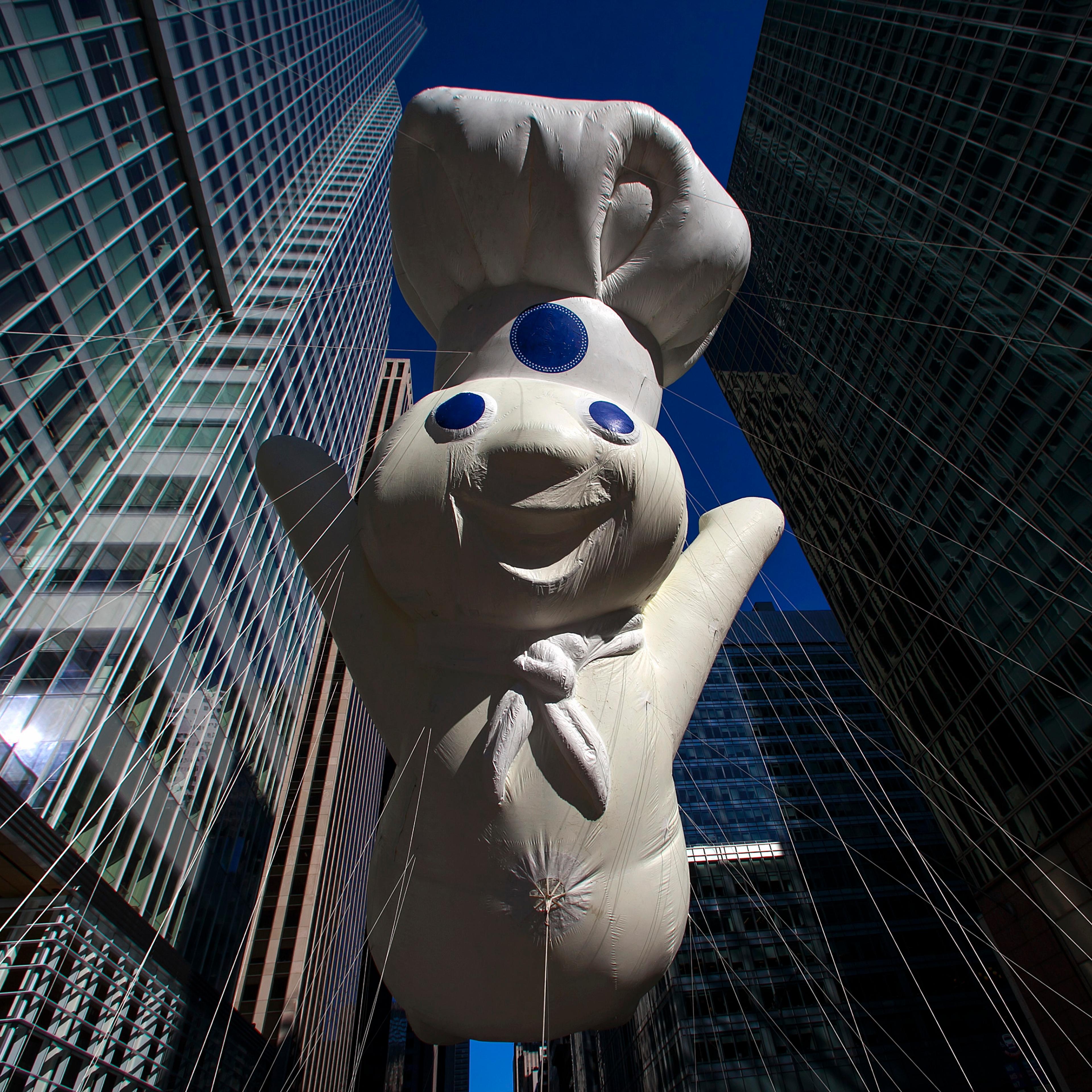 A Pillsbury Doughboy balloon float at the 87th Macy's Thanksgiving Day Parade in New York November 28, 2013