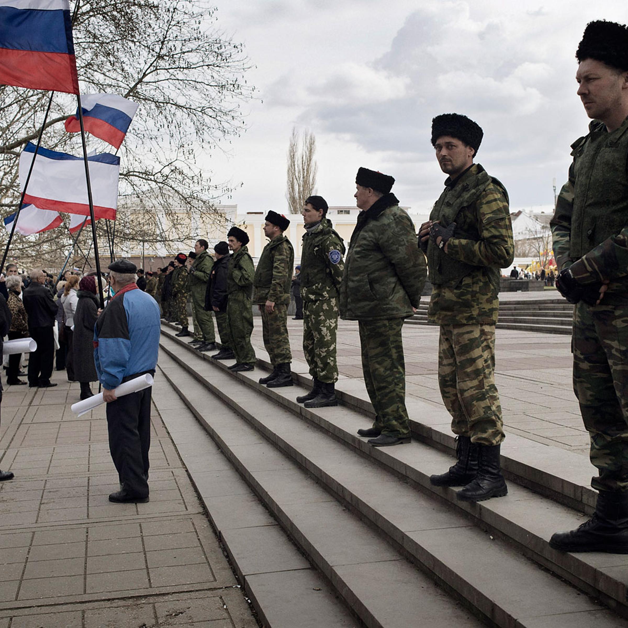 Cossacks guard the local parliament building in Crimea's capital Simferopol, March 6, 2014.