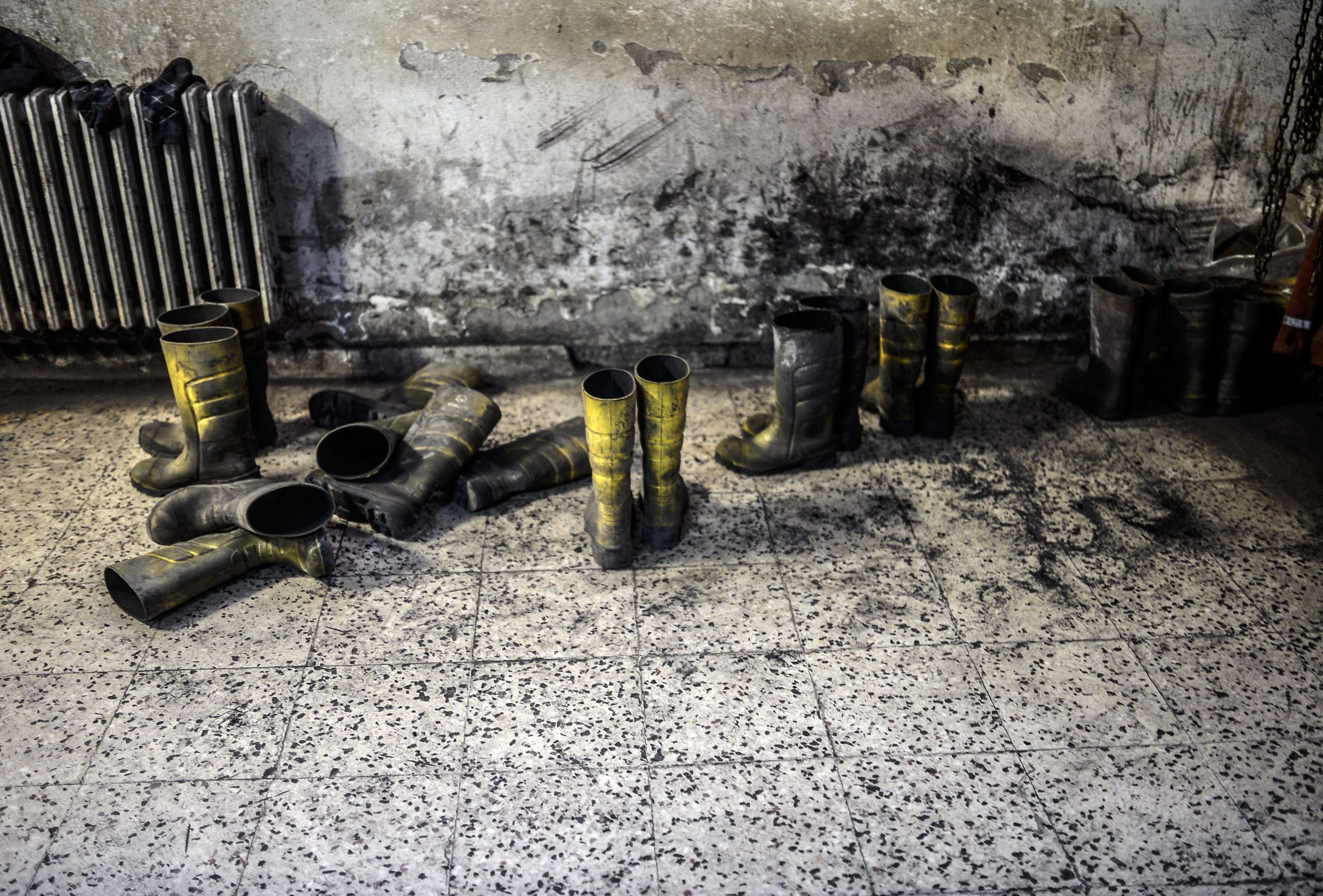 Boats of miners are pictured in an outside building after searching for hours hundreds of co-workers who remain trapped underground on May 14, 2014 after an explosion and fire in their coal mine in the western Turkish province of Manisa.