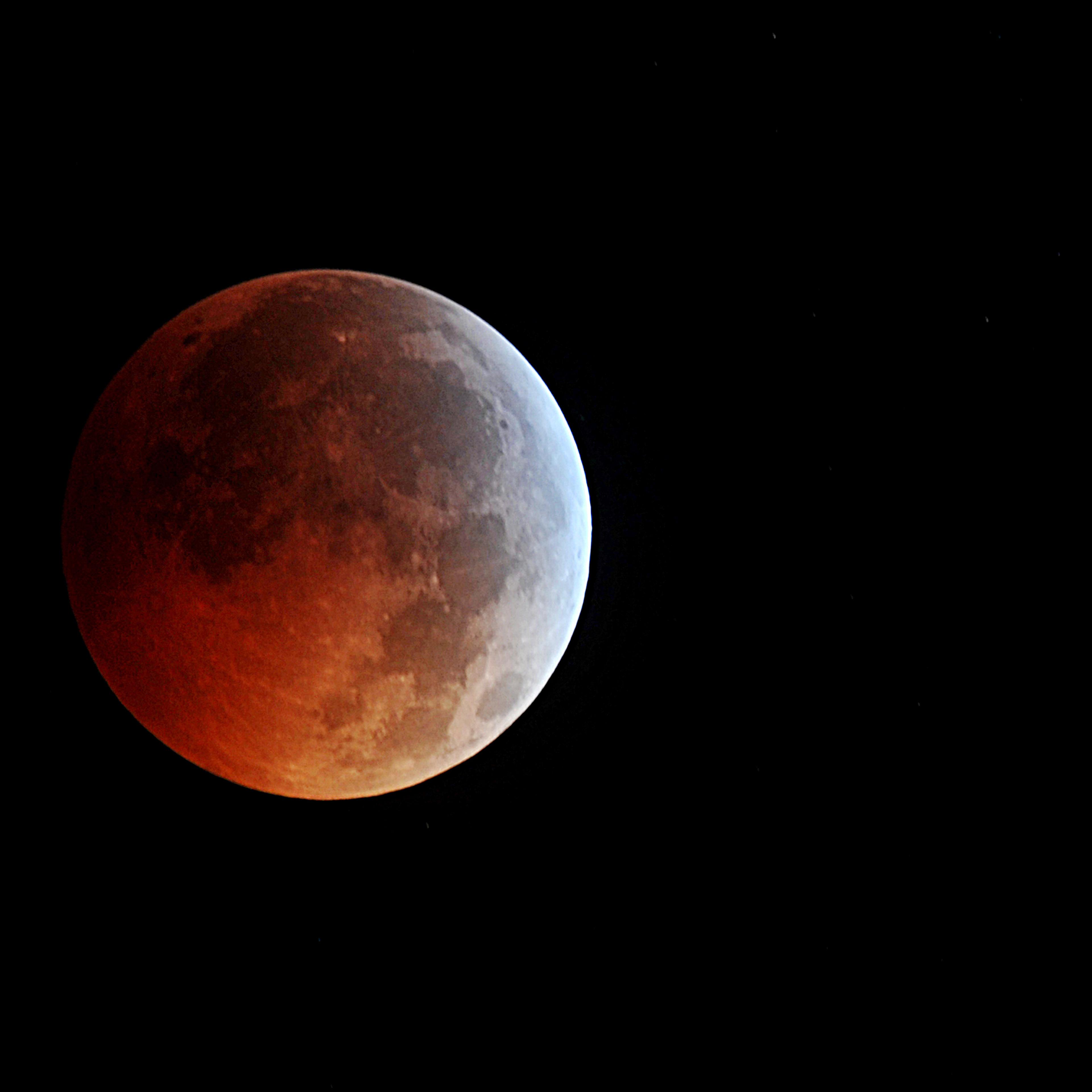 Lights out: a blood moon as a total lunar eclipse reaches its peak