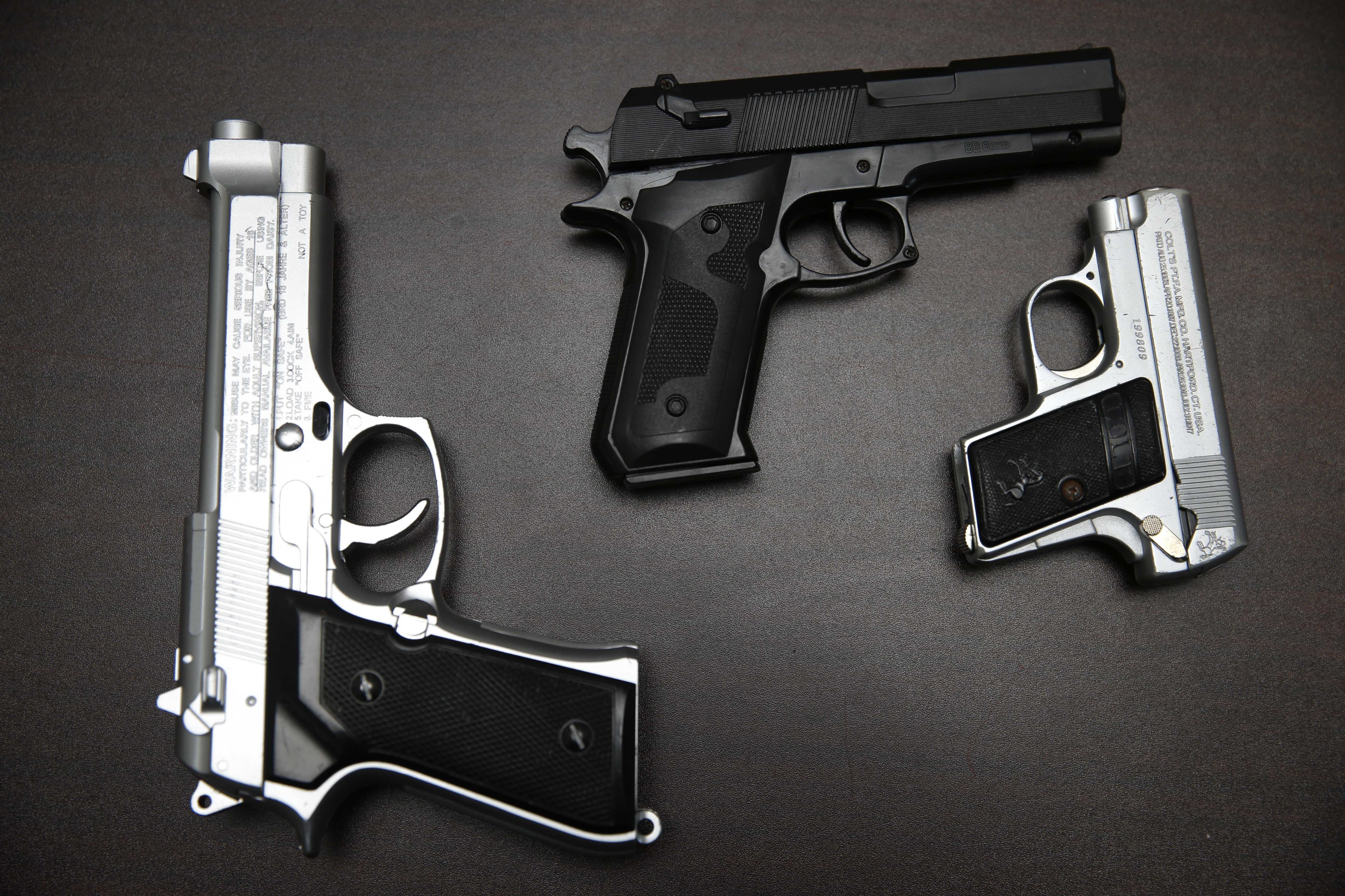 Confiscated fake guns are displayed during a Transportation Security Administration (TSA) news conference at John. F. Kennedy Airport in New York on Nov. 18, 2014.