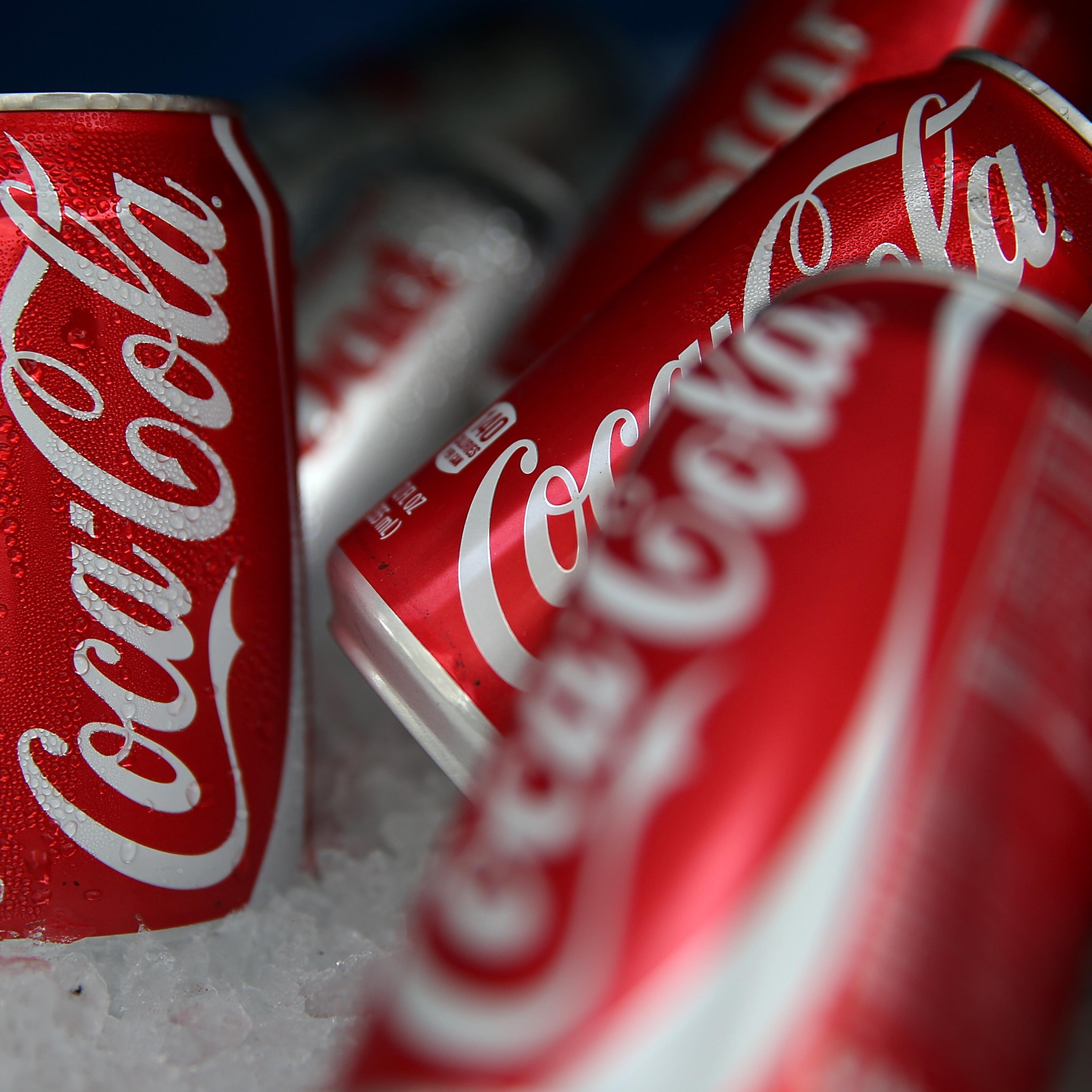 Cans of Coca-Cola