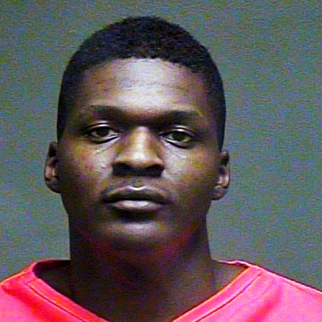 20-year-old Quinton Dashawn Laster after being arrested on Feb. 9, 2016. Police found the decapitated bodies of his grandmother, Sharon Reed, 59, and her husband, James Earl Reed, 78, in their Oklahoma City home.
