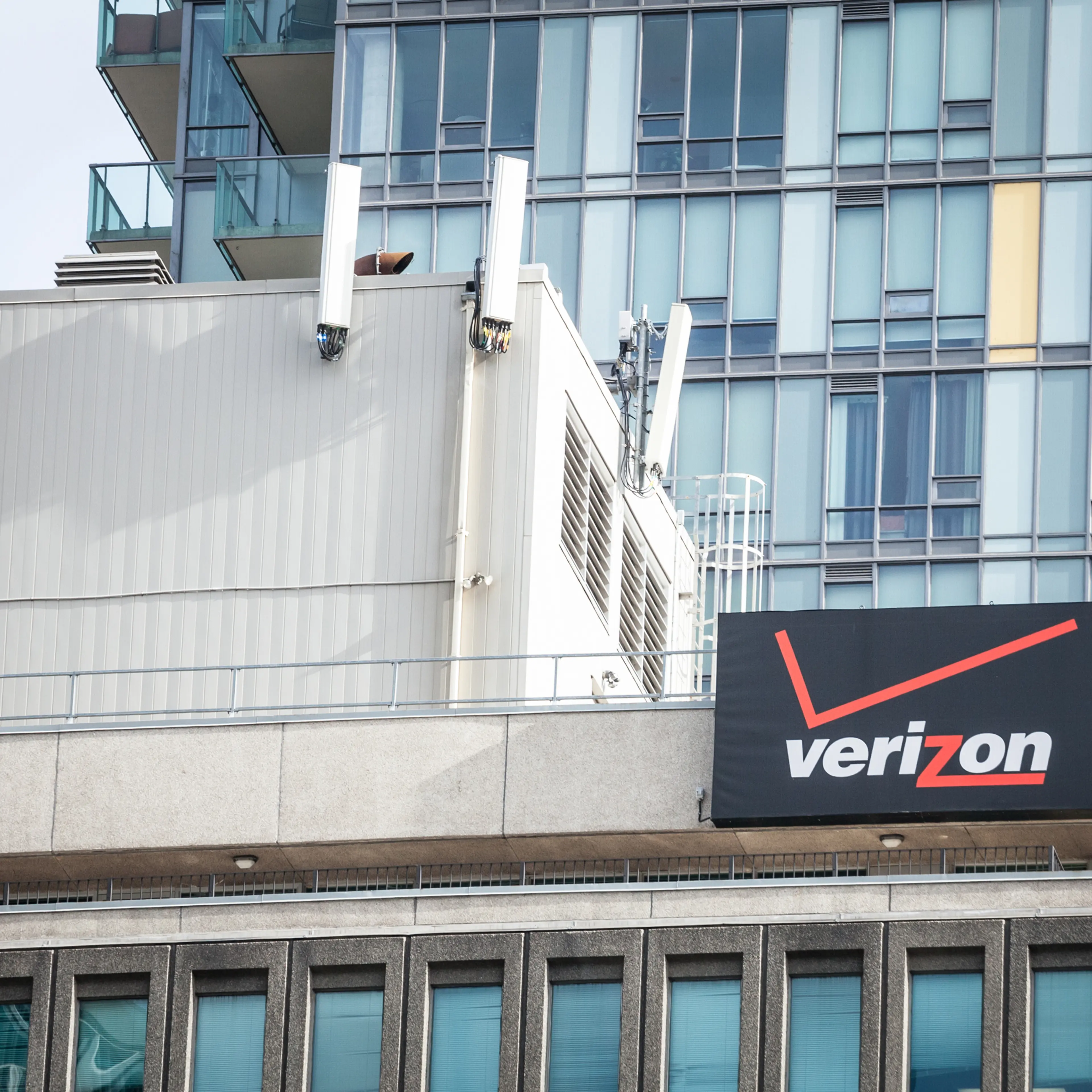 Verizon logo on their main office in Toronto, Ontario. Verizon is an american telecommunications and phone corporation, carrier and operator