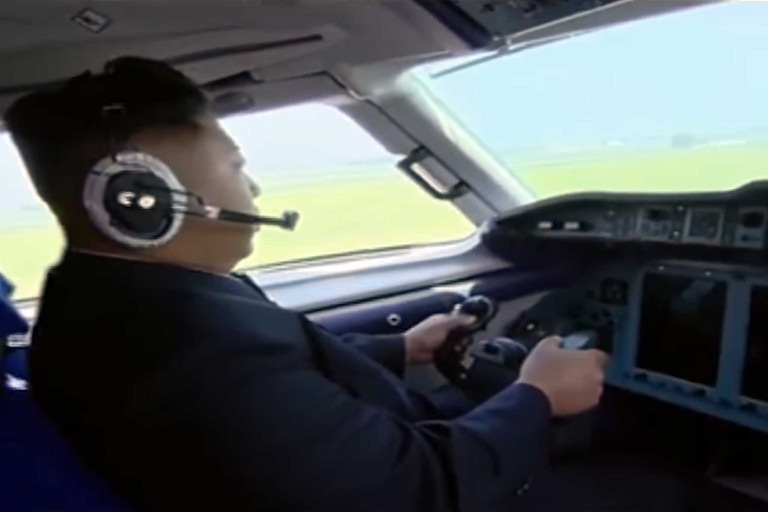 Kim Jong Un in the cockpit of a plane