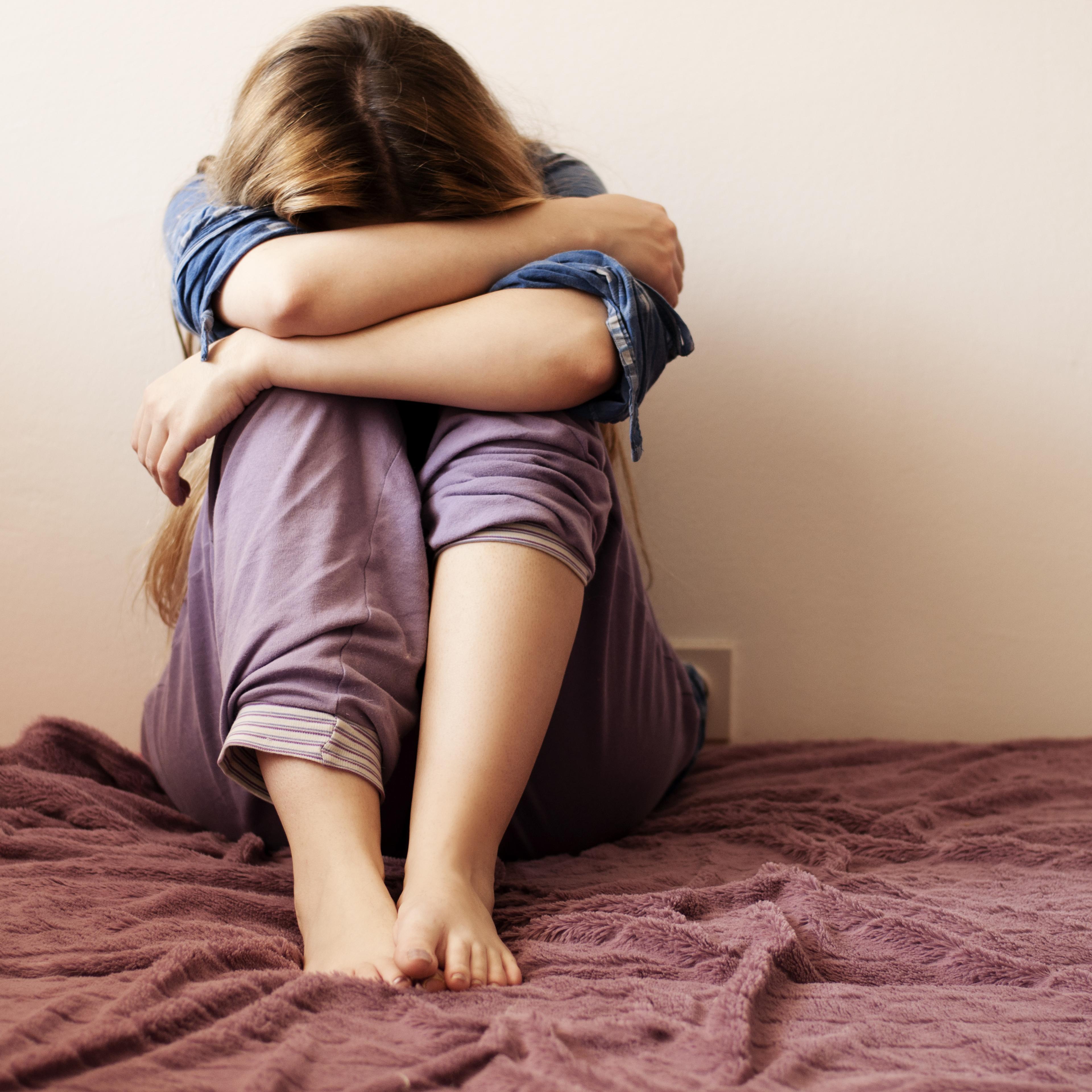 woman-sitting-depressed