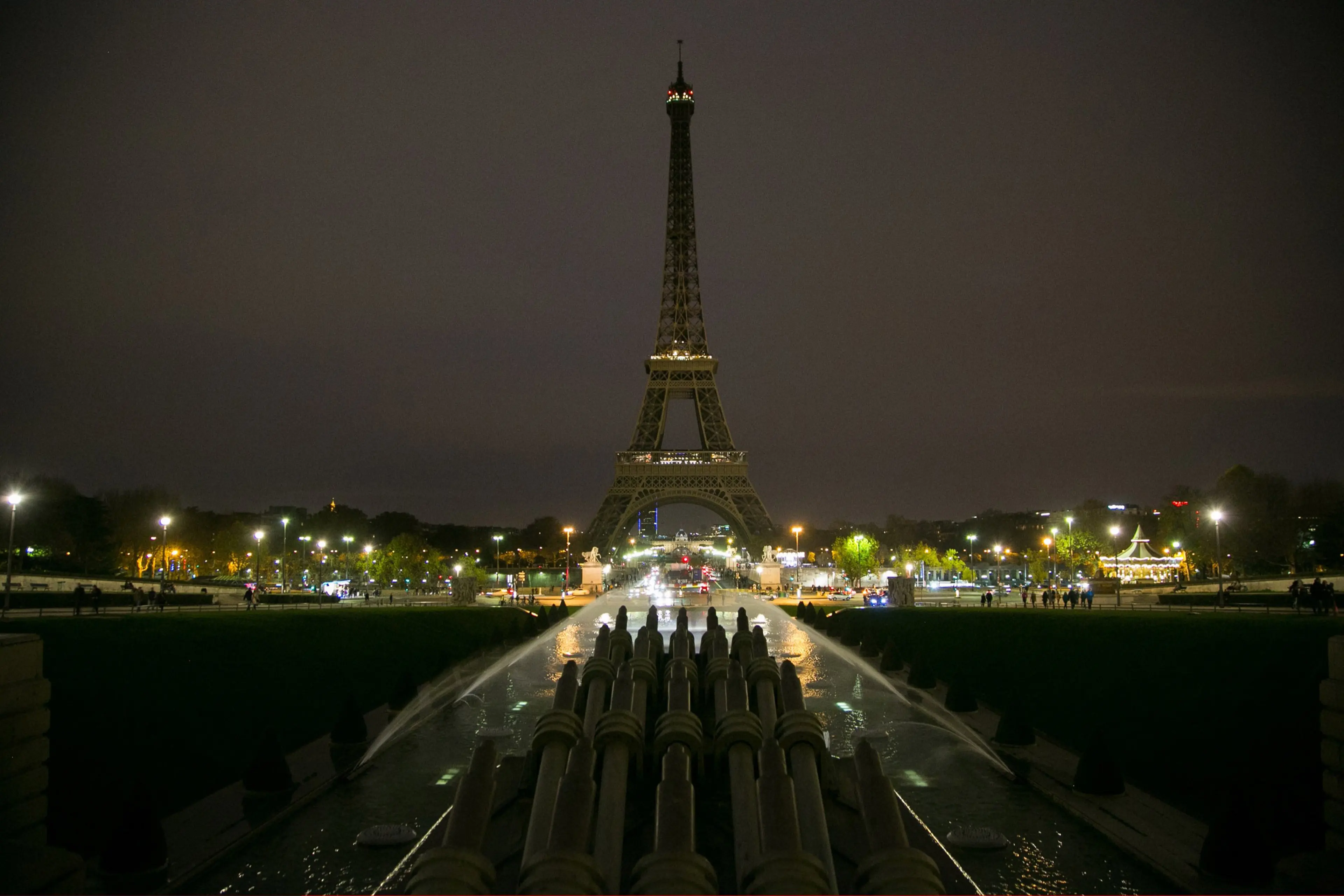 The Eiffel Tower turns off its lights in memory of the more than 120 victims the day after the terrorist attack on Nov. 14, 2015 in Paris.