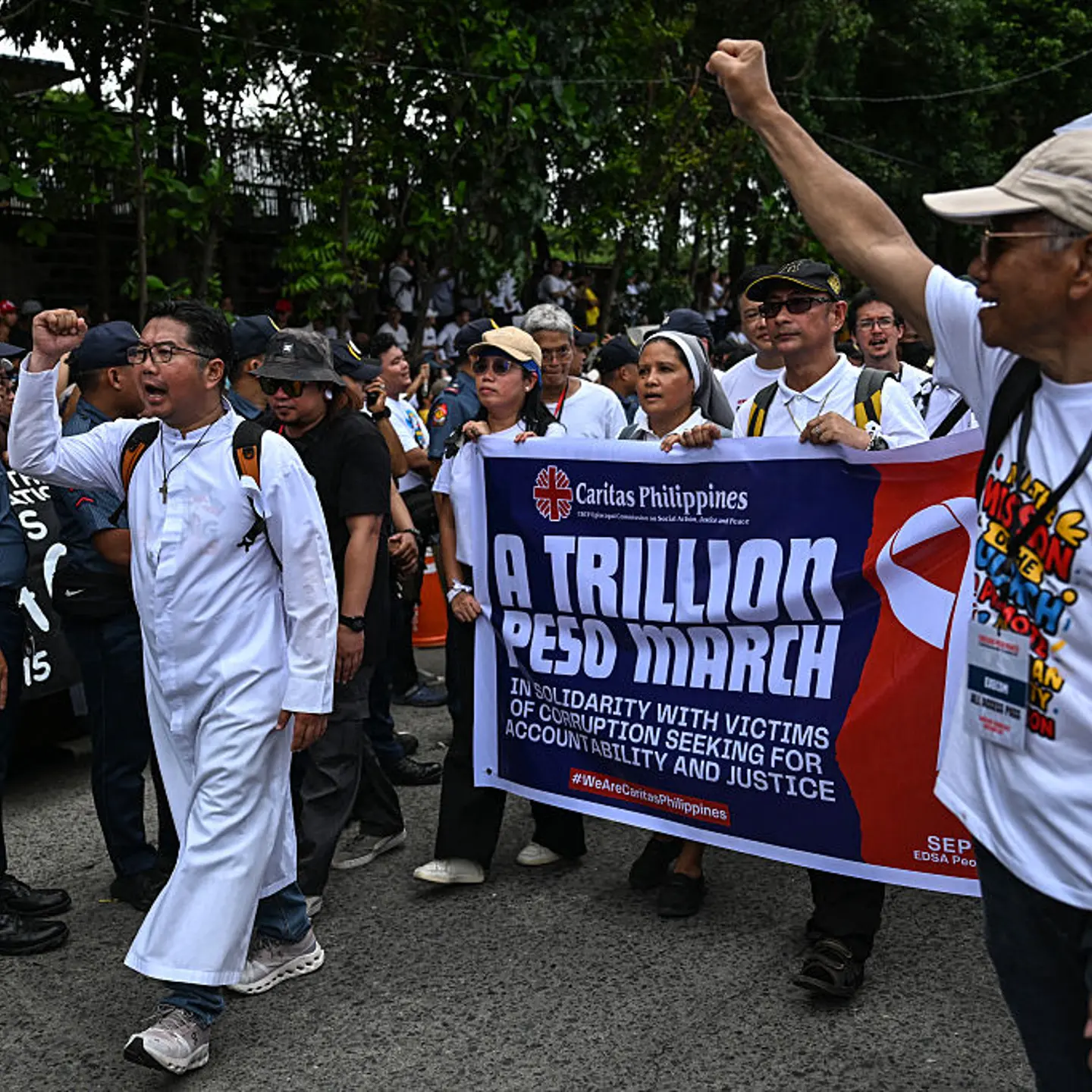 Protesters take part in a rally as they demonstrate against corruption following the revelations over bogus flood control projects, one of the country's biggest corruption scandals in decades, at the People Power Monument in Quezon City, Metro Manila, Ph