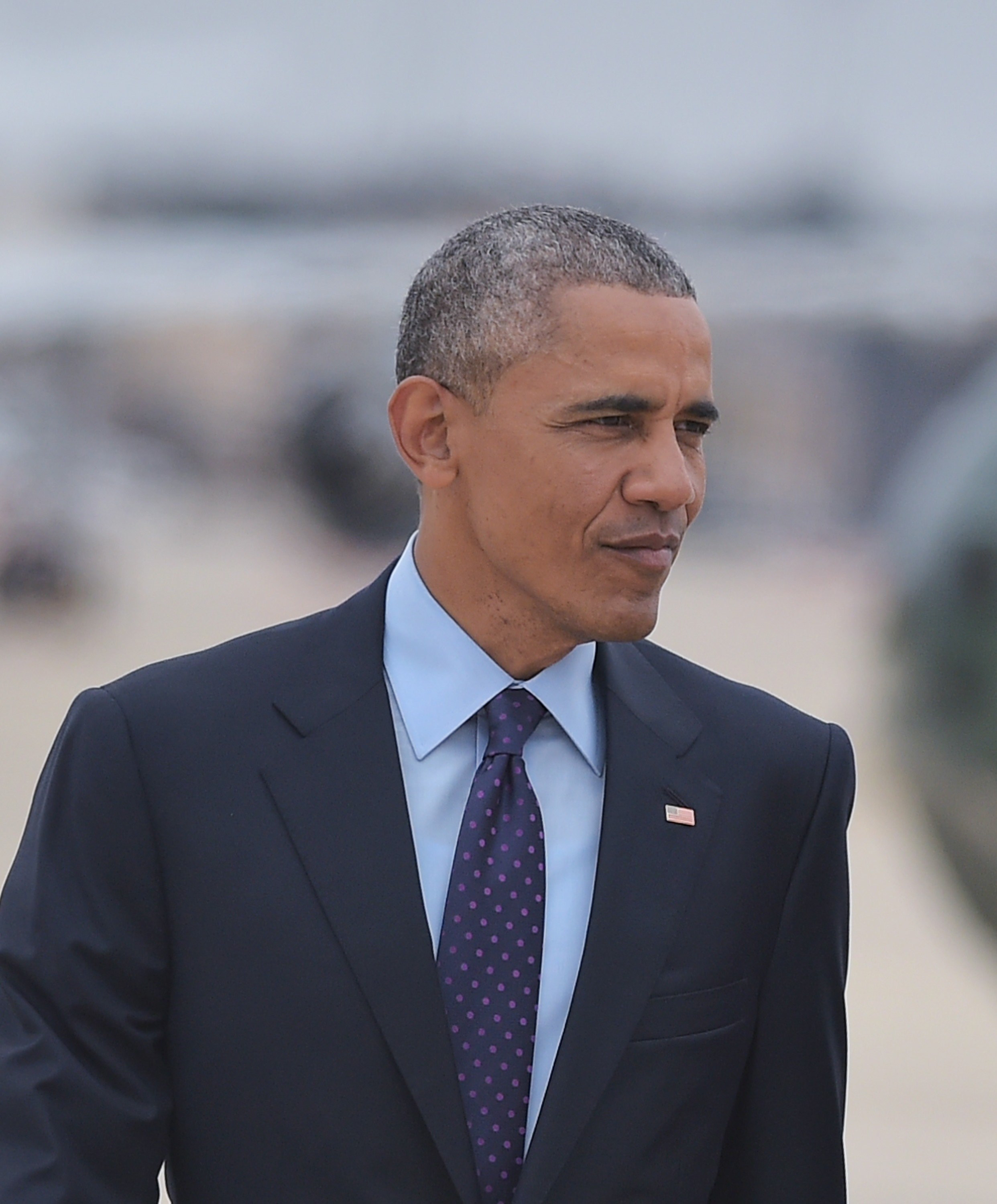 President Barack Obama makes his way to Air Force One before departing from Andrews Air Force Base in Maryland on April 8, 2015.