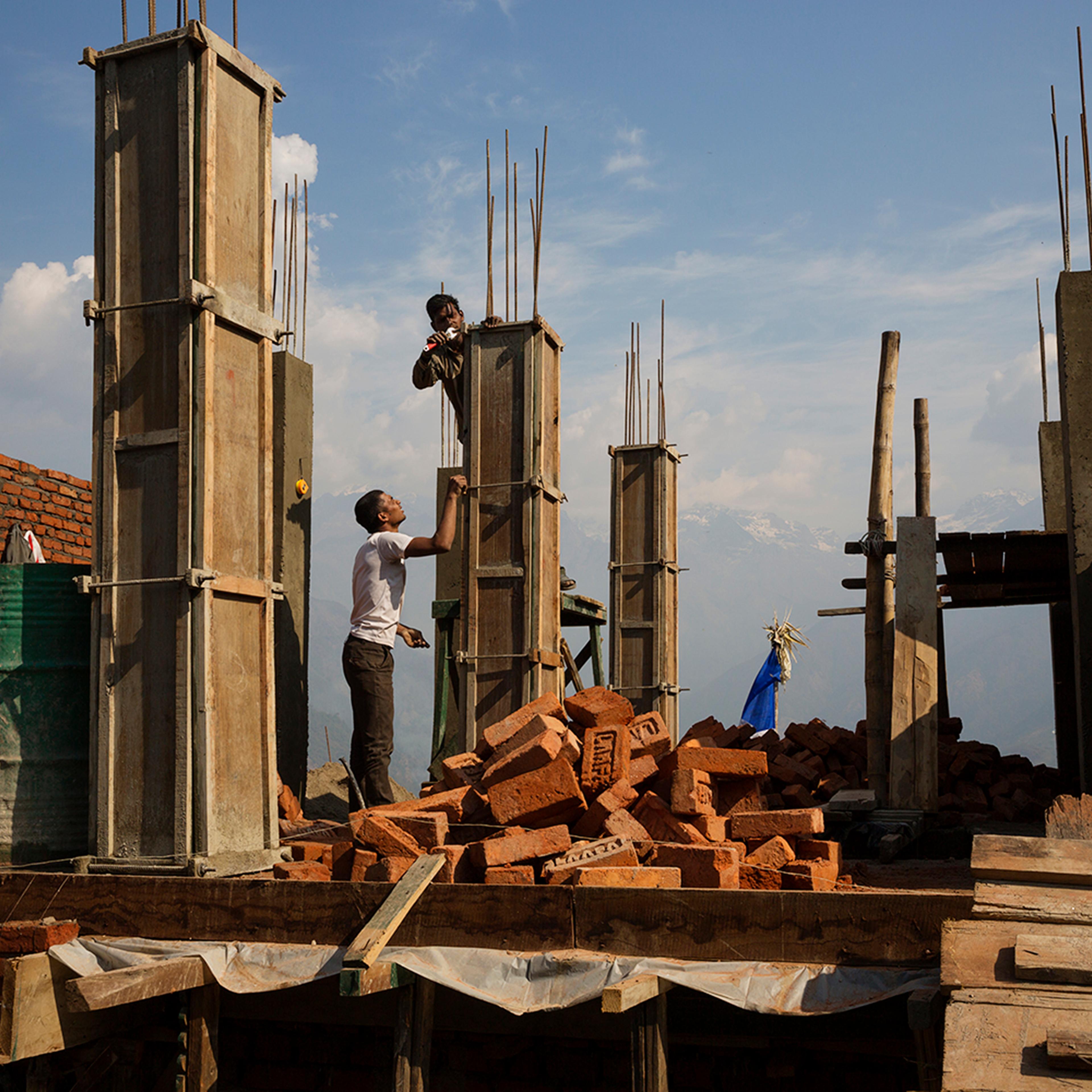 Villagers rebuilding houses in Barpak, in Gorkha district, Nepal, at the epicenter of the 2015 earthquakes, which were the worst natural disaster to befall Nepal in more than eight decades, April 7, 2016.