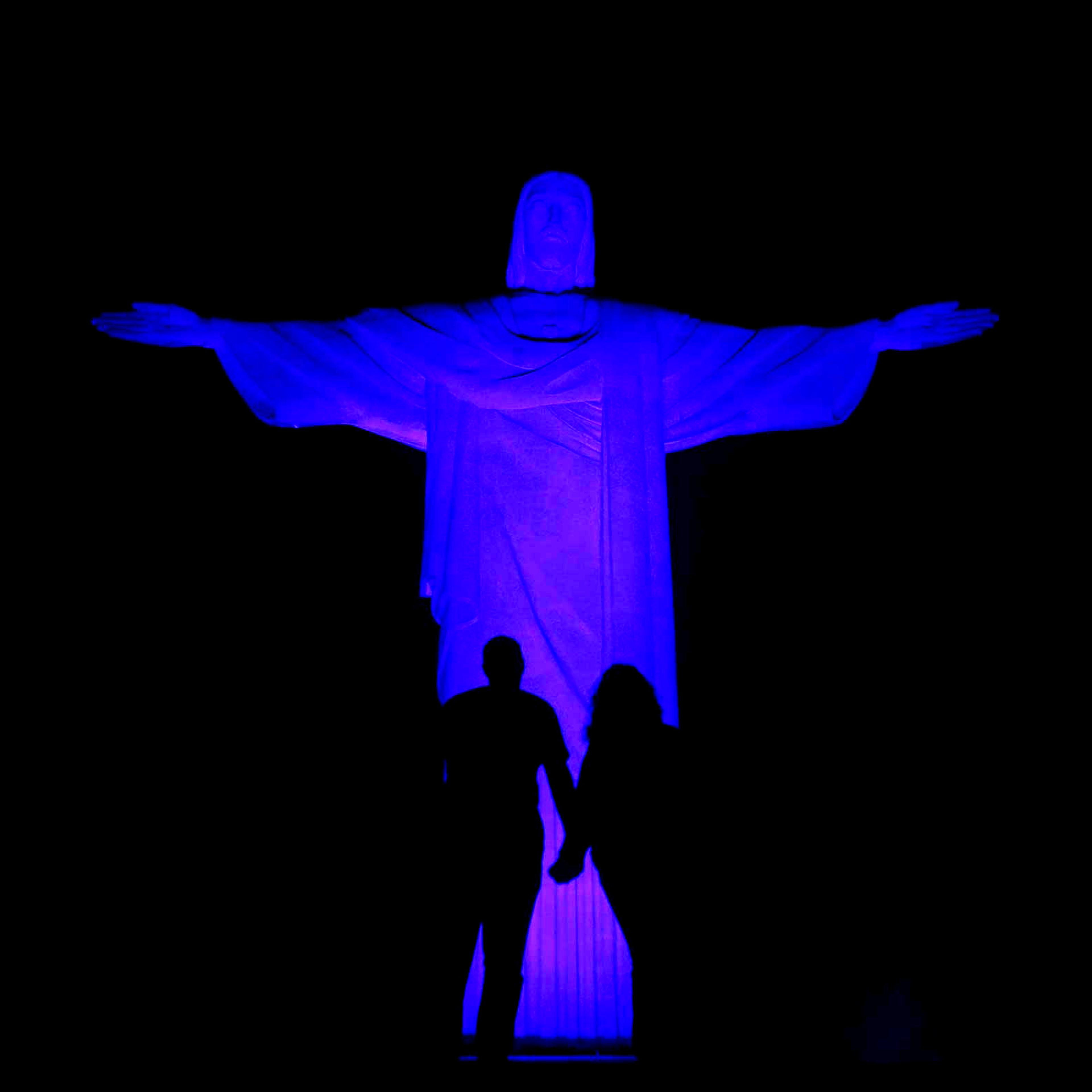 The statue of Christ the Redeemer is lit up in blue for the "Light It Up Blue" campaign to mark the World Autism Awareness Day in Rio de Janeiro