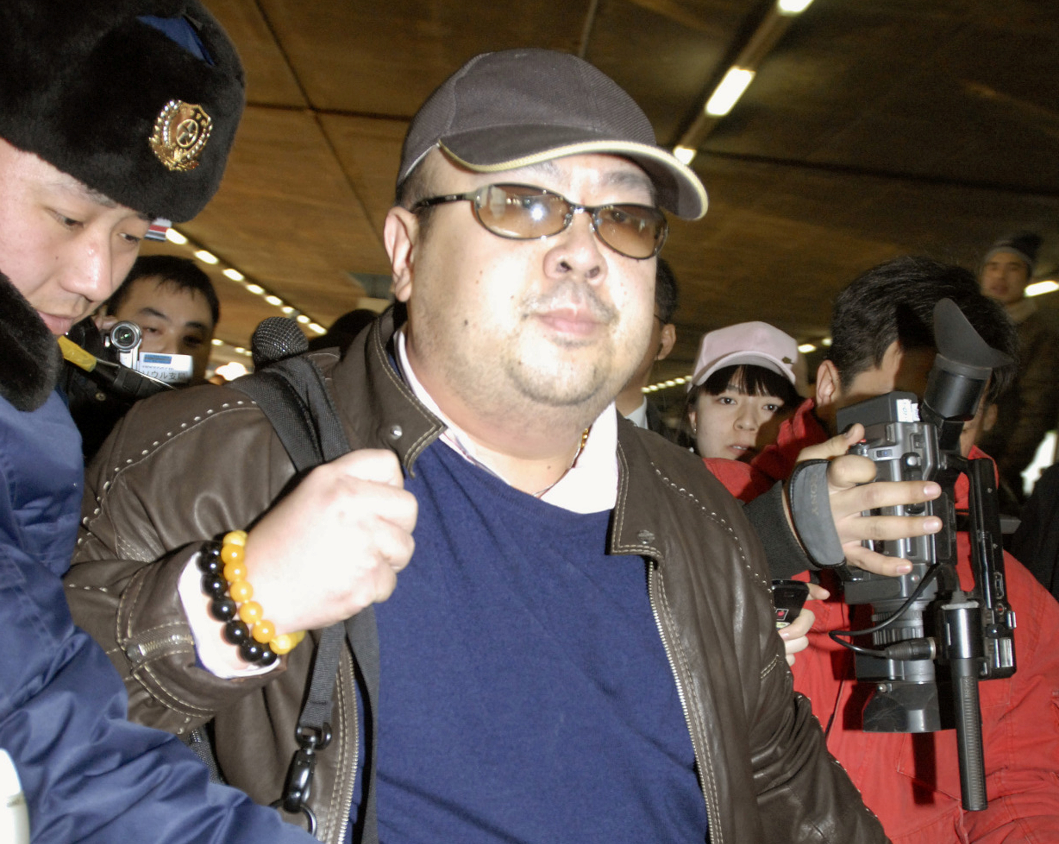 Kim Jong Nam arrives at Beijing airport in Beijing, China, in this photo taken by Kyodo