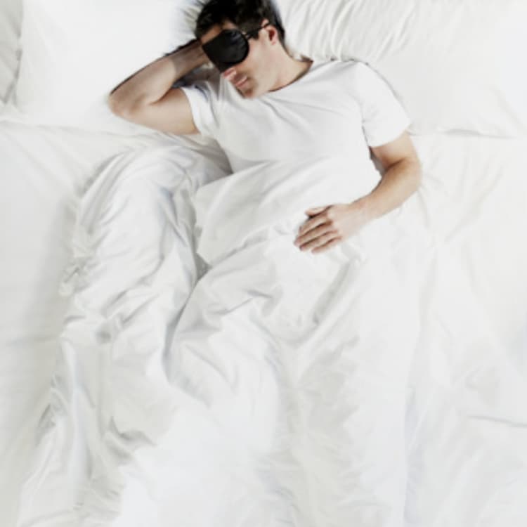 man-sleeping-bed