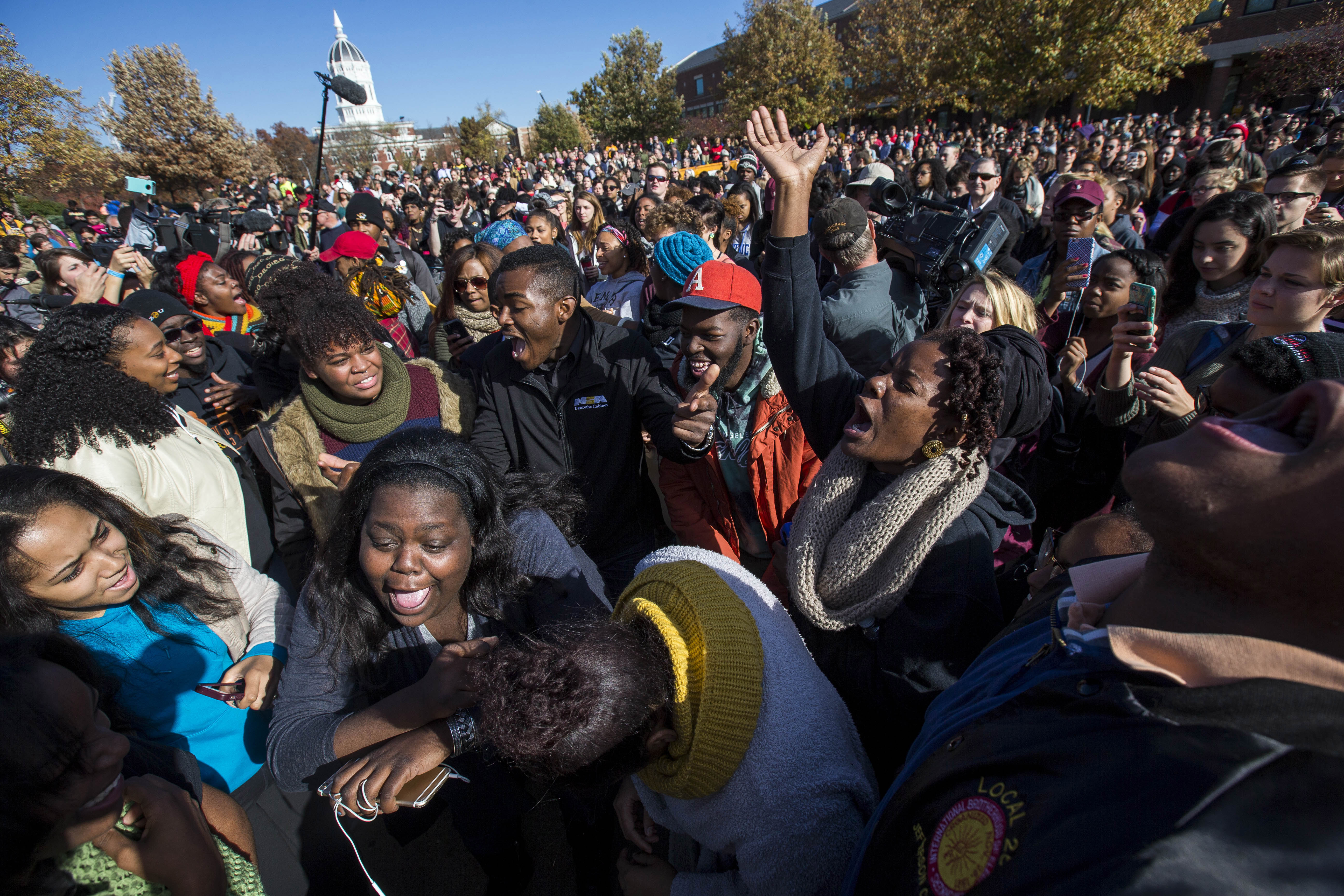 Protesters celebrate after the resignation resignation of Missouri University president Timothy M. Wolfe on the Missouri University Campus in Columbia, MO on Nov. 9, 2015.