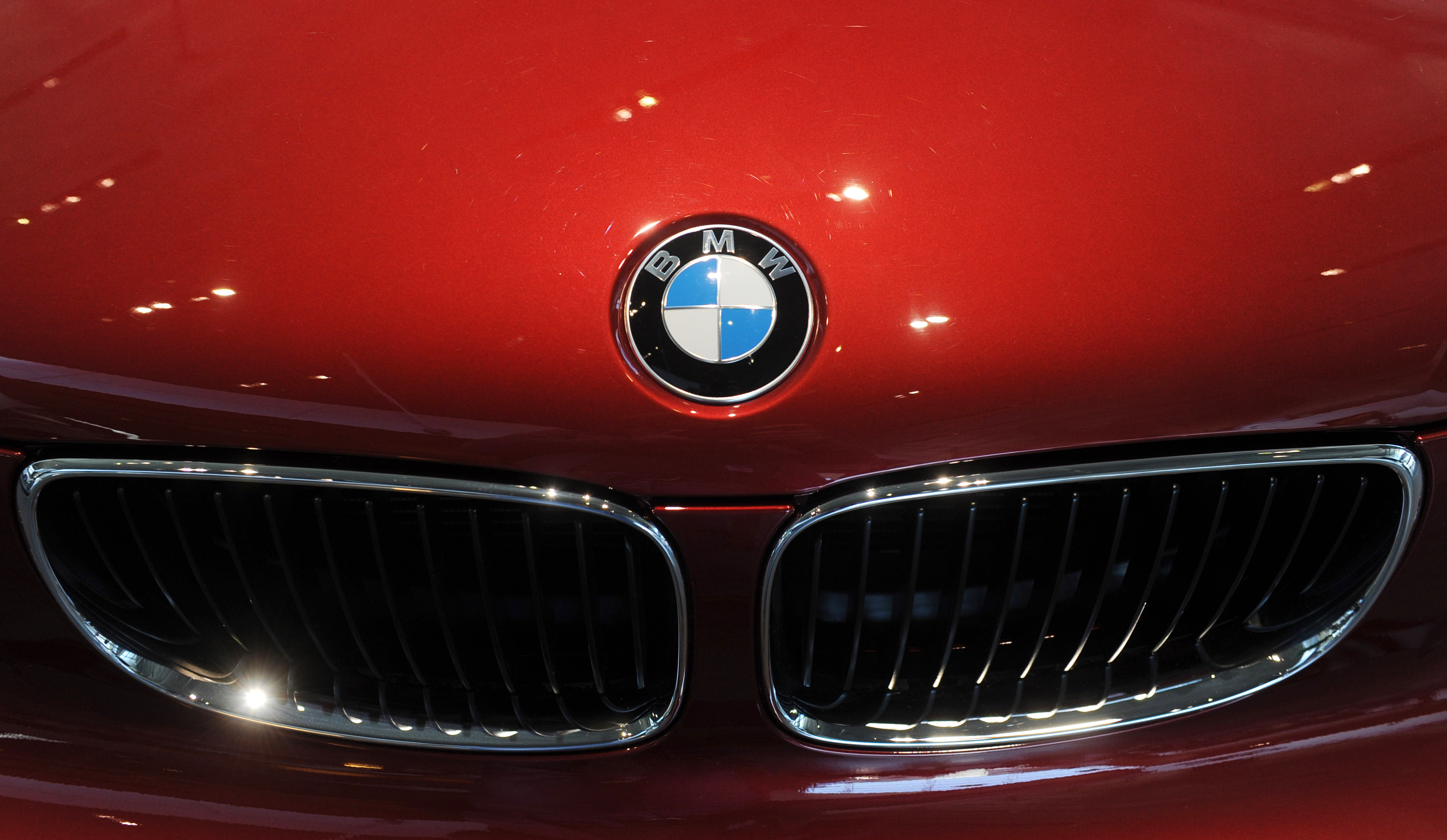 The logo of German luxury car maker BMW can be seen on a BMW car in Munich, Germany, on March 15, 2011.