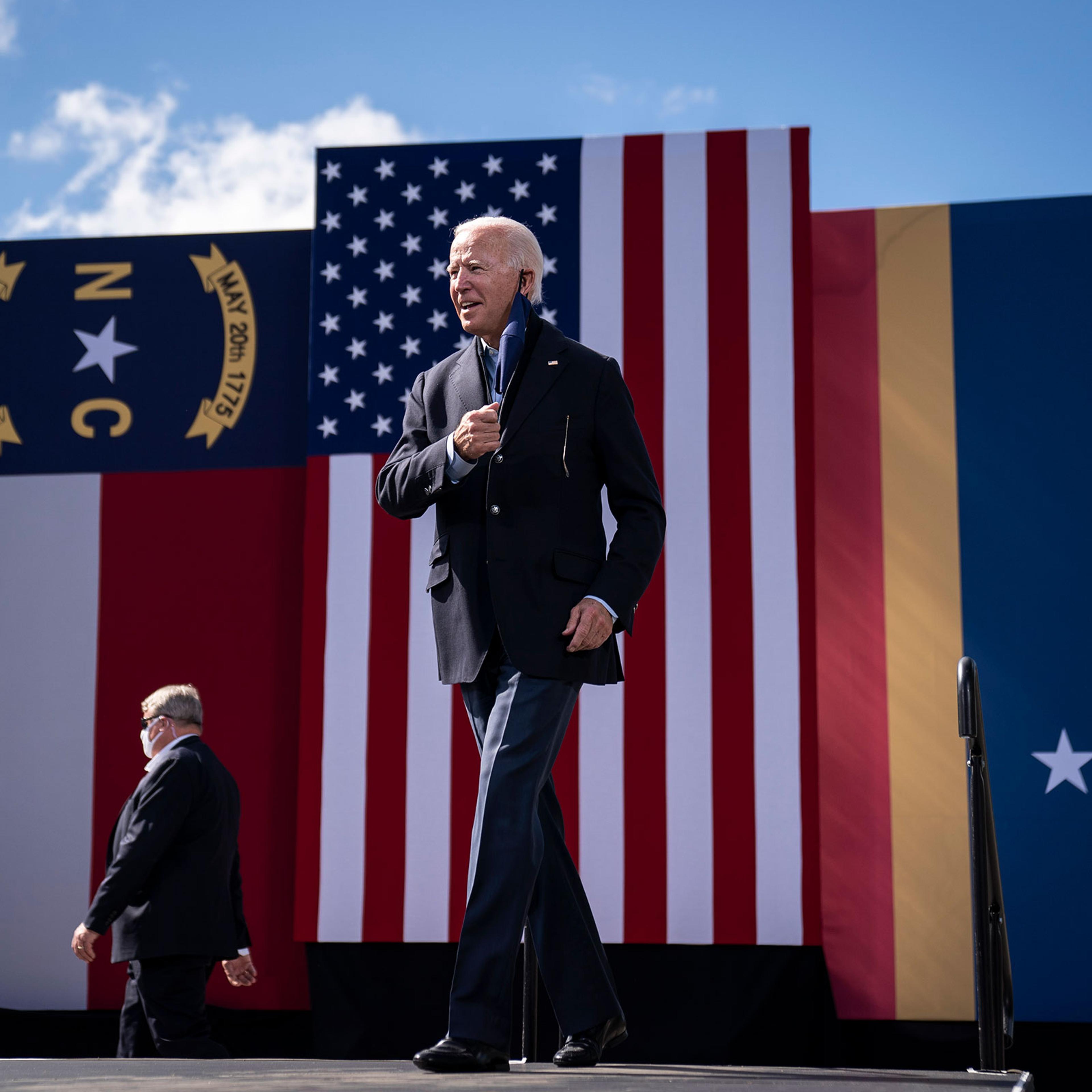 Democratic presidential nominee Joe Biden arrives to speak at a drive-in campaign rally at Riverside High School on Oct. 18, 2020 in Durham, North Carolina.