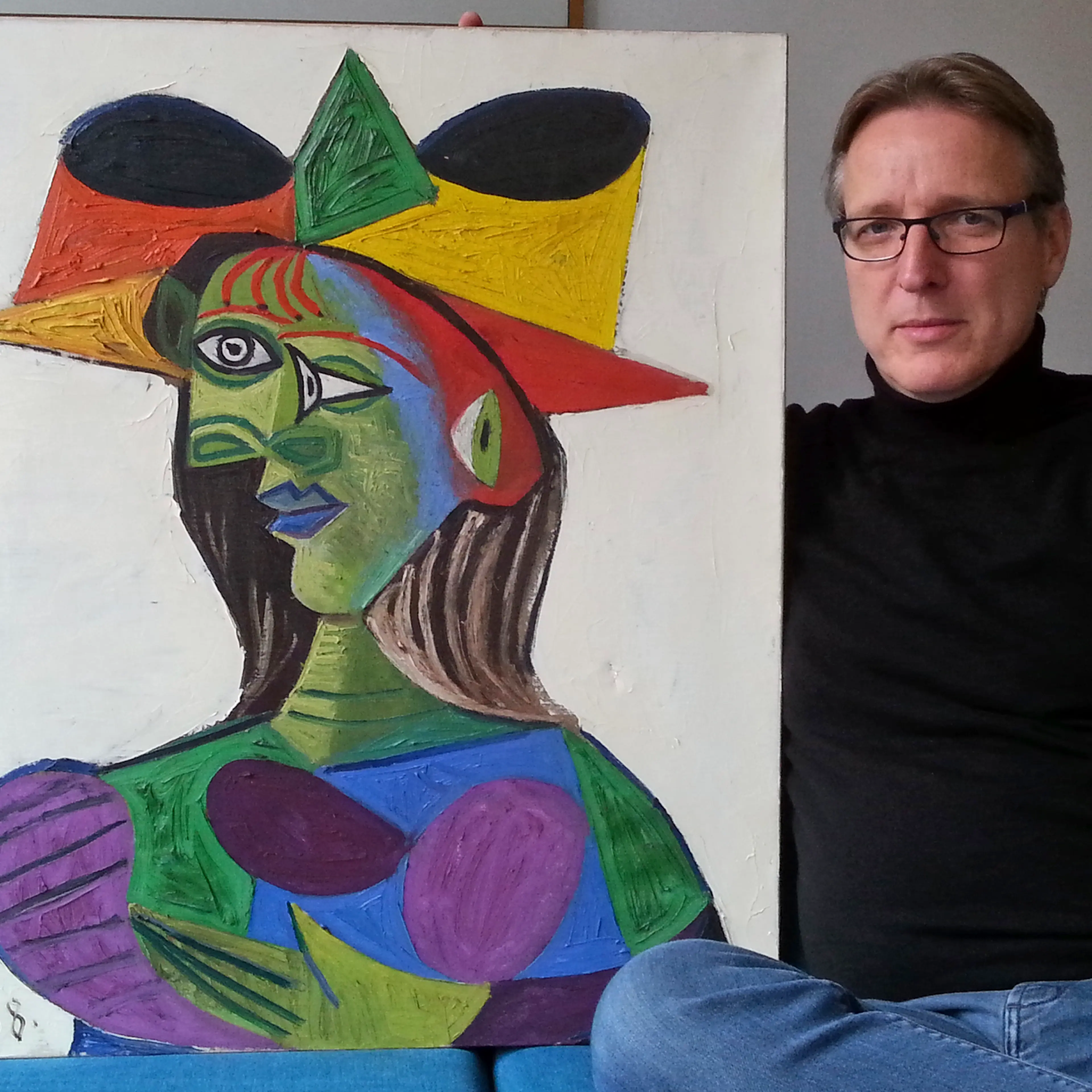 Dutch art detective Arthur Brand sits with "Buste de Femme", a recovered Picasso painting