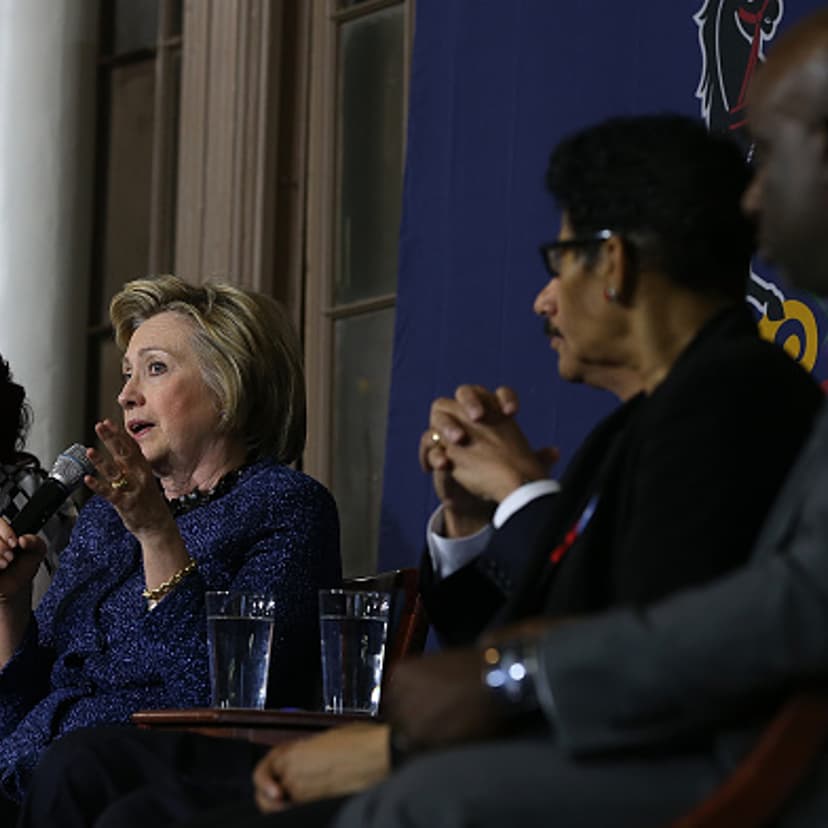 Democratic presidential candidate former Secretary of State Hillary Clinton (L) speaks during a panel discussion on gun violence at St. Paul's Baptist Church on April 20, 2016 in Philadelphia, Pennsylvania.