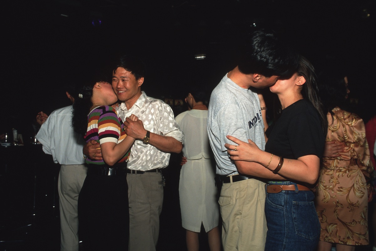 Slow dancing at a disco next to Jinjiang Hotel in downtown