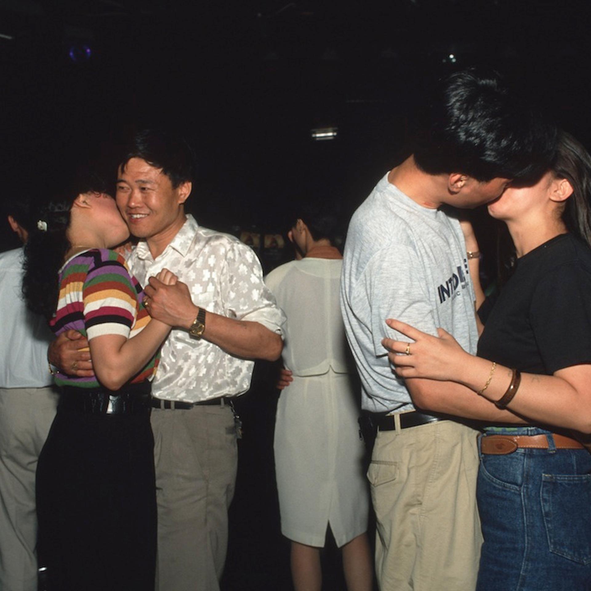Slow dancing at a disco next to Jinjiang Hotel in downtown
