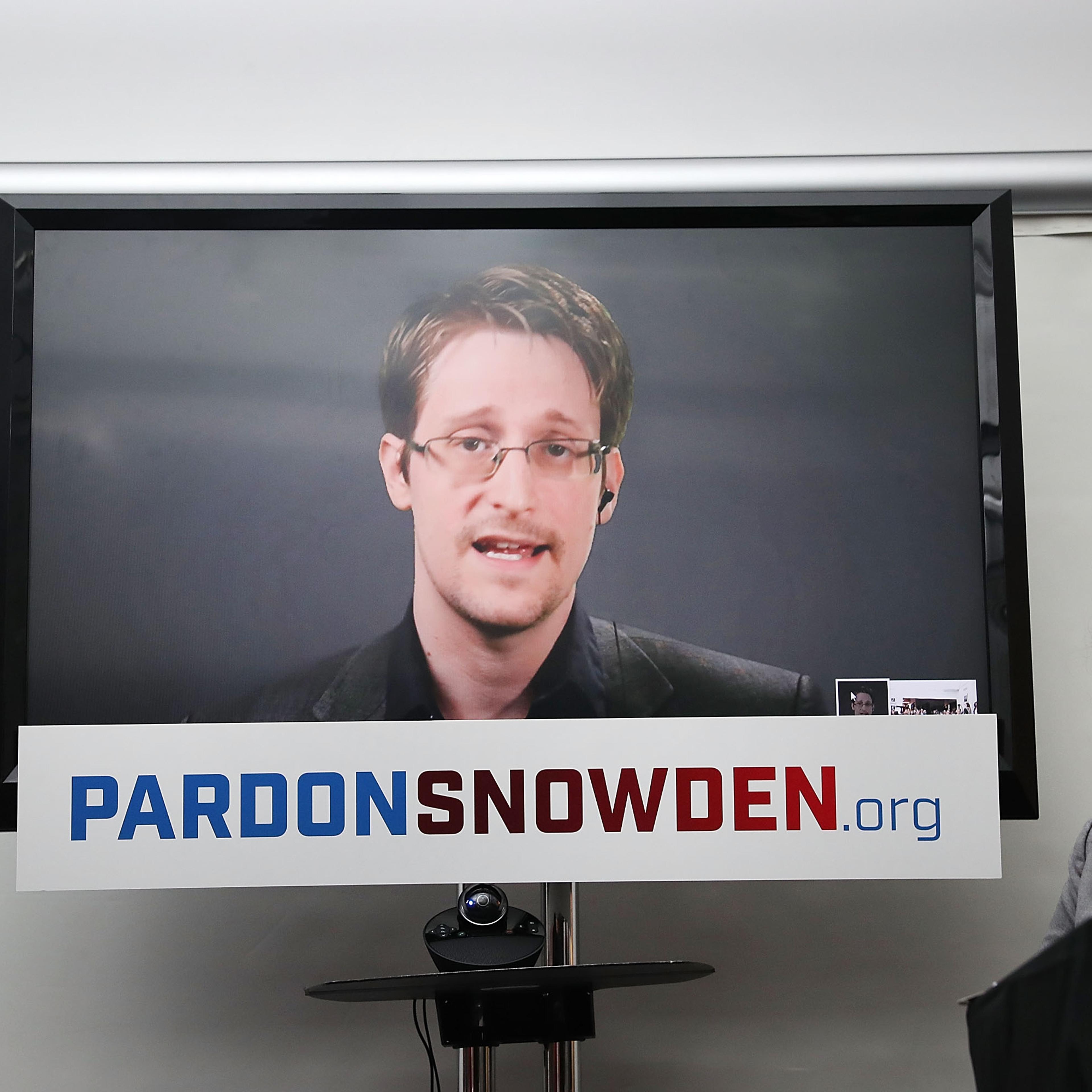 Edward Snowden speaks via video link at a news conference for the launch of a campaign calling for President Obama to pardon him in New York City on Sept. 14, 2016.