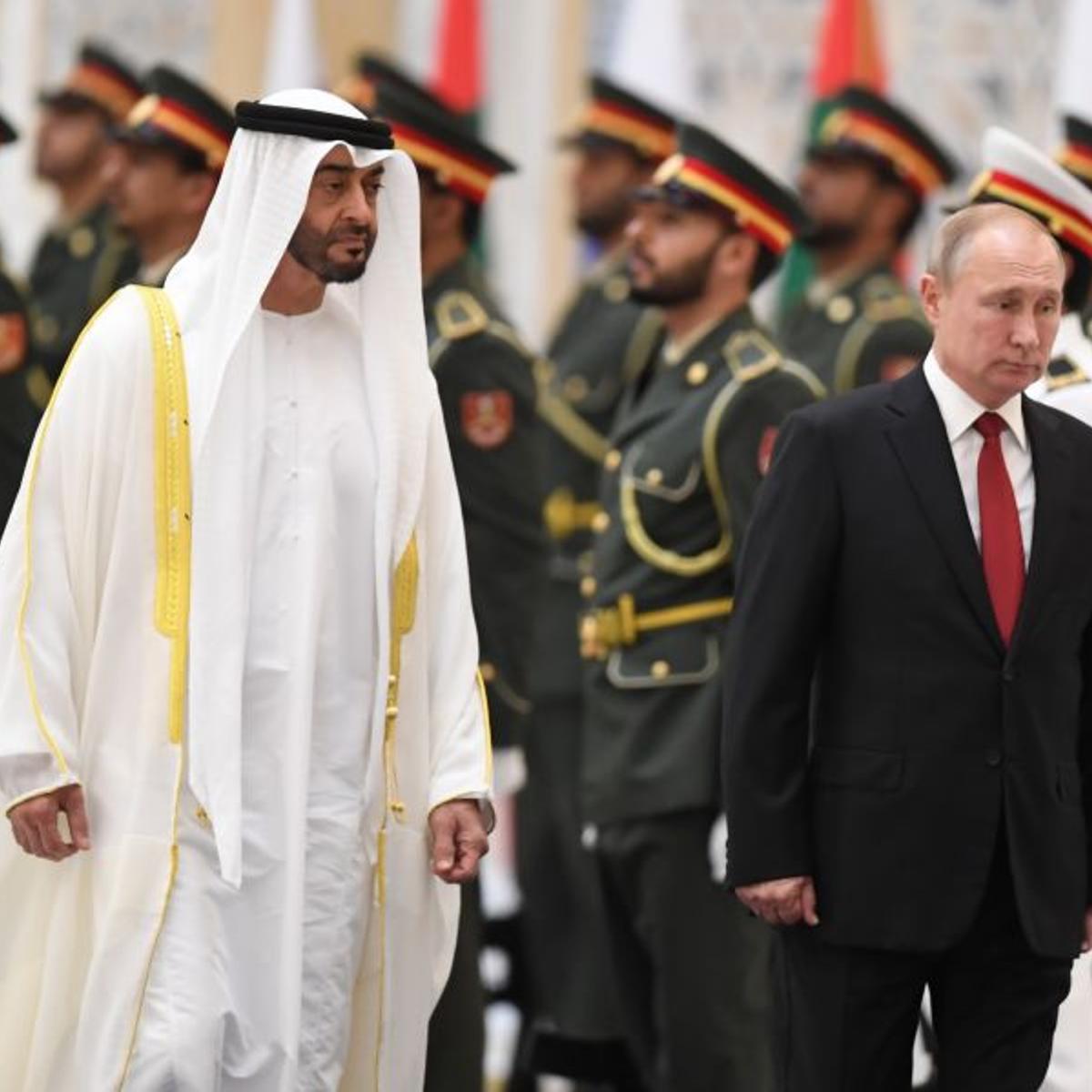 Russian President Vladimir Putin (R) is received by Sheikh Mohamed bin Zayed al-Nahyan, Crown Prince of Abu Dhabi, during an official welcoming in the Emirati capital's Al-Watan presidential palace on Oct 15, 2019.