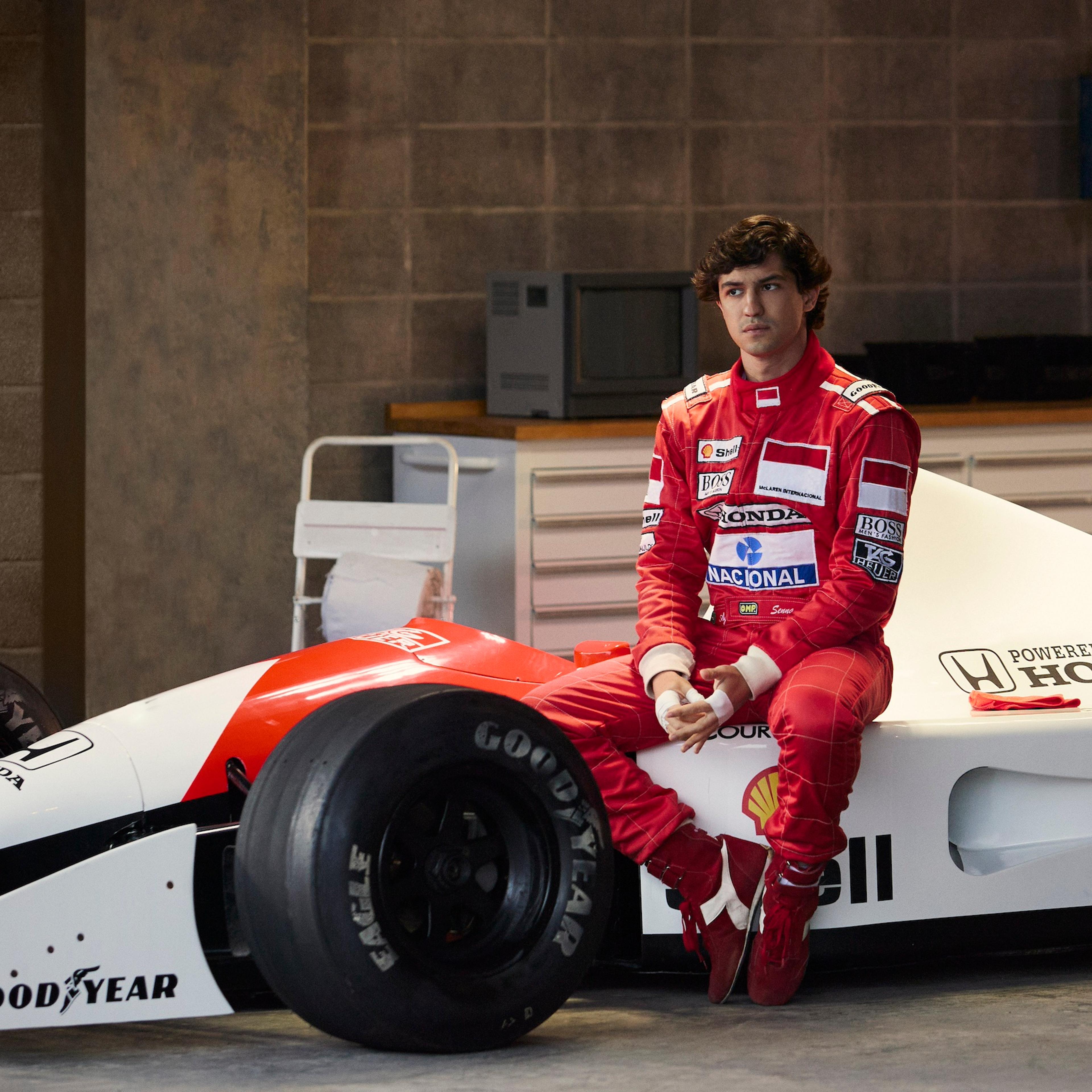 An Image from the Senna series depicting an actor sitting on a race car