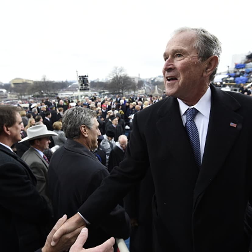 Former US President George W. Bush leaves after the Presidential Inauguration at the US Capitol on January 20, 2017 in Washington, DC.