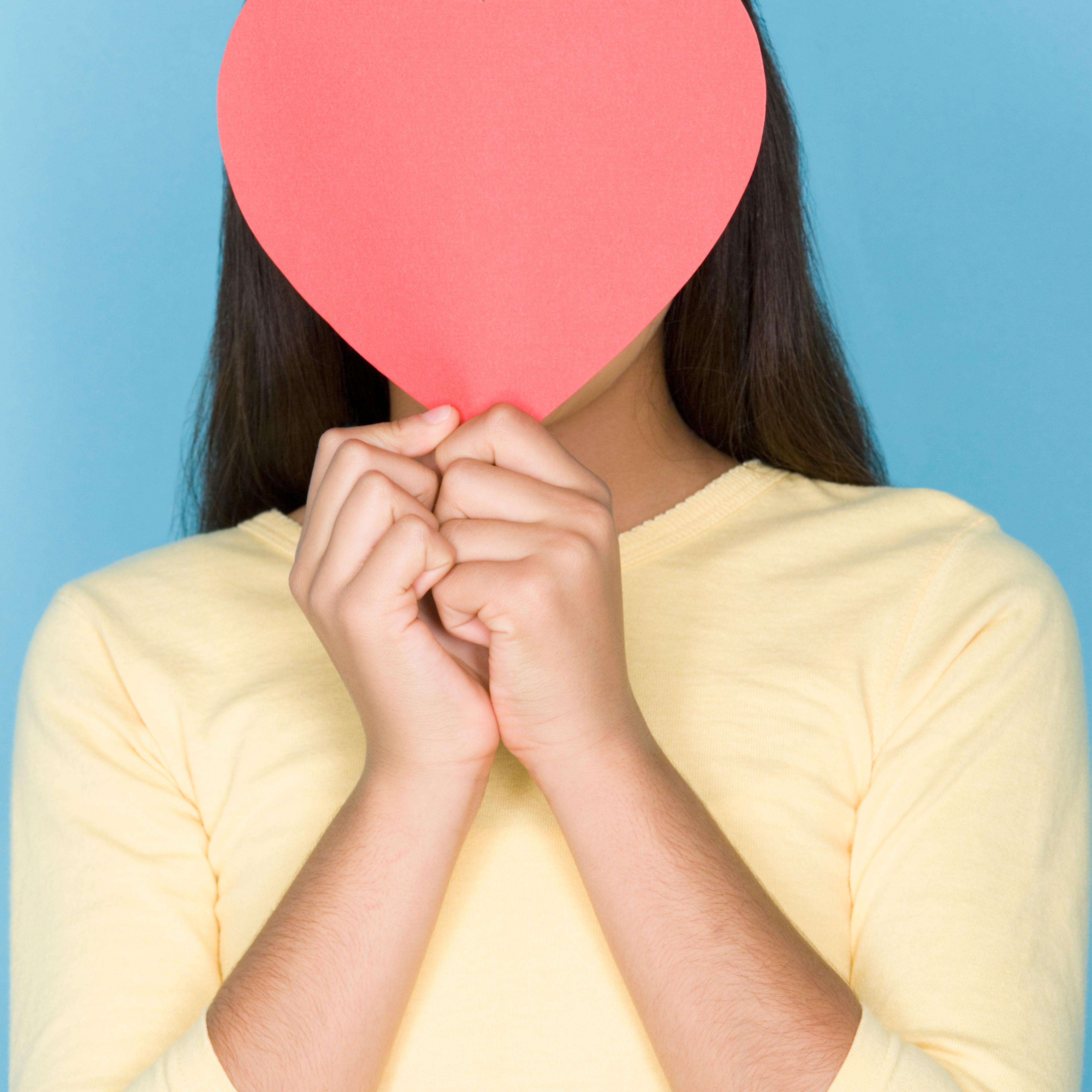 girl-holding-heart