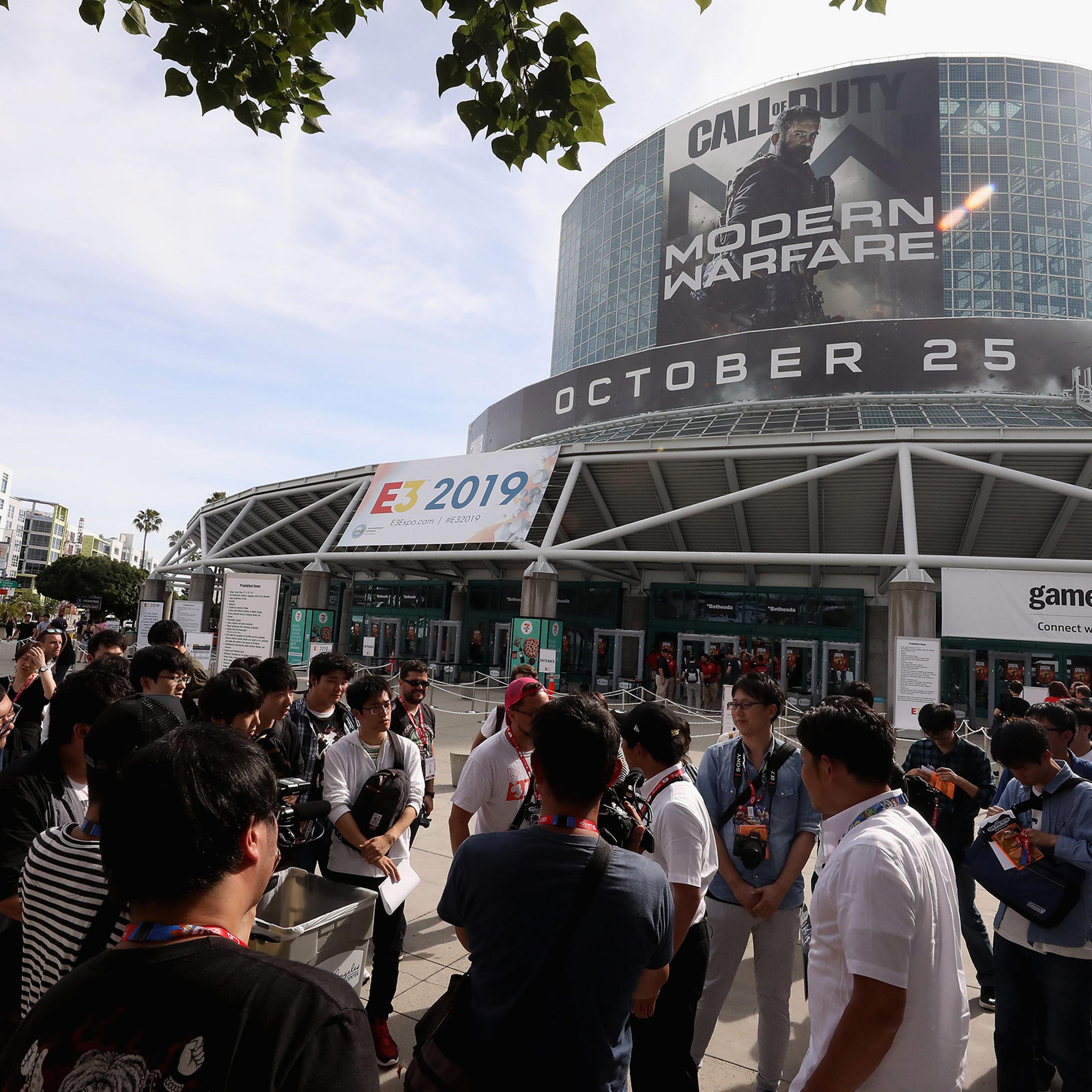 Game enthusiasts and industry personnel arrive to the Los Angeles Convention Center ahead of the E3 Video Game Convention on June 10 in Los Angeles, California.