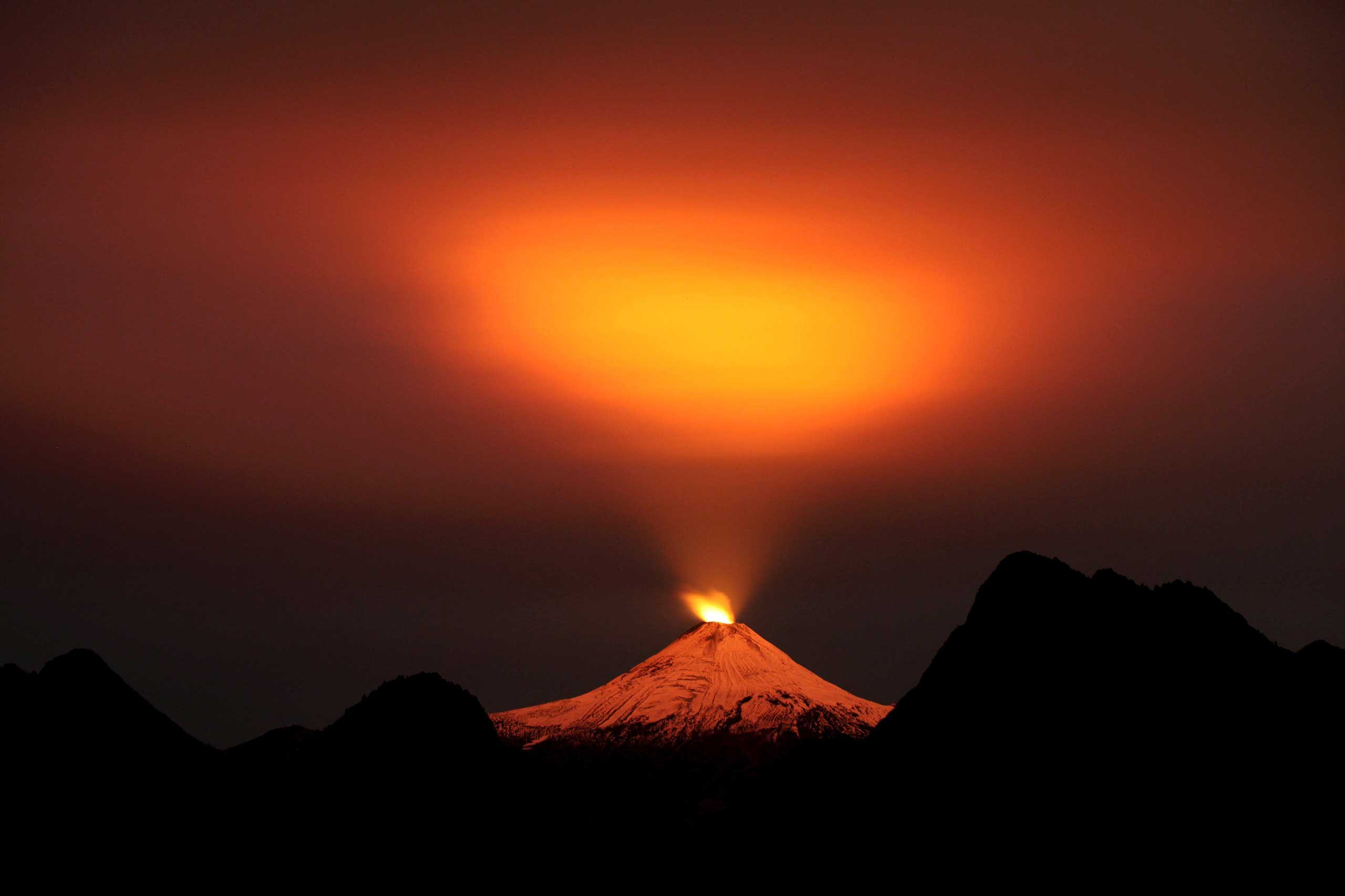 The Villarrica Volcano at night in Pucon town, Chile on May 10, 2015.