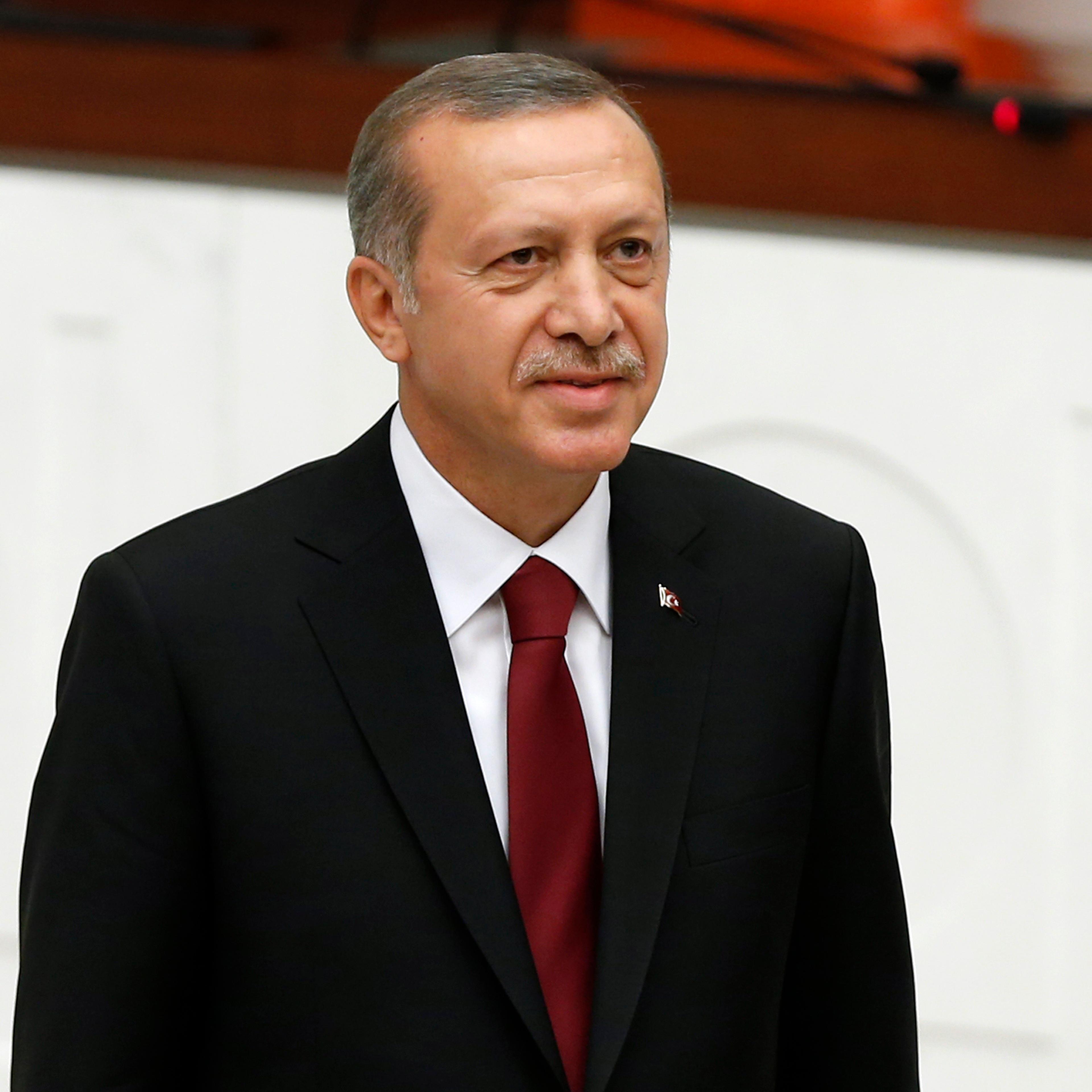Turkey's new President Erdogan attends a swearing in ceremony at the parliament in Ankara