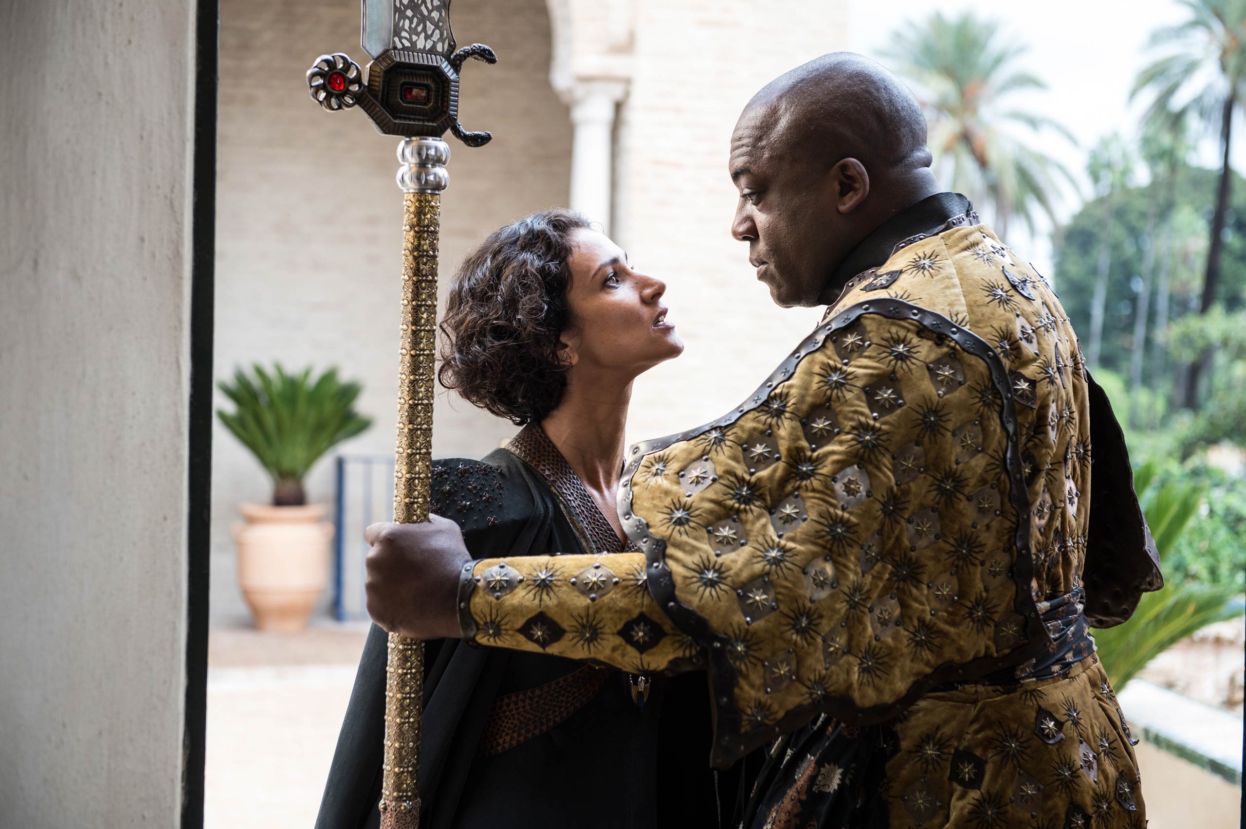 Indira Varma as Ellaria Sand and Deobia Opaeri as Areo Hotah. 