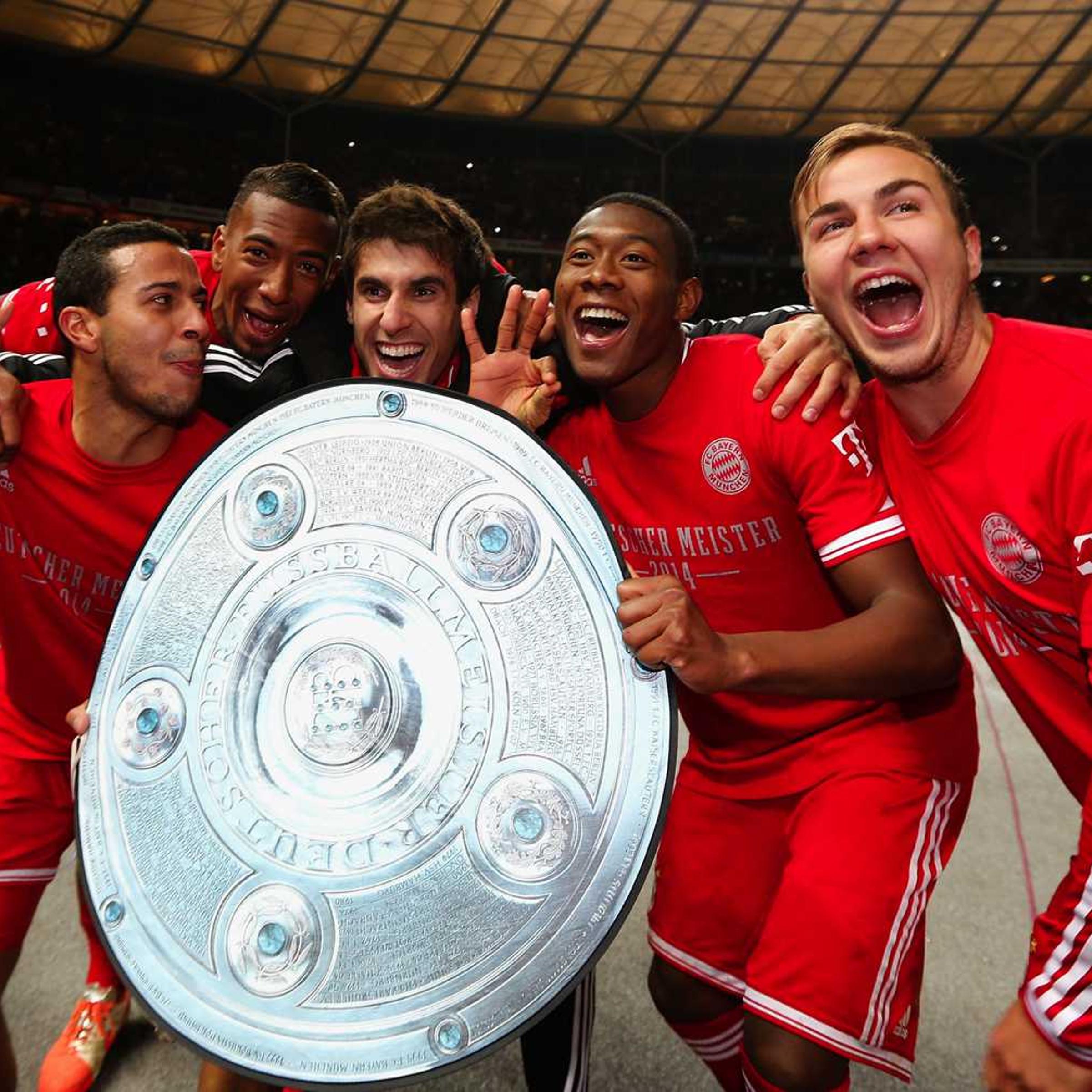 Thiago Alcantara, Jerome Boateng, Javier Martínez Aguinaga, David Alaba and Mario Goetze of Bayern Muenchen celebrate winning the German Championship after the Bundesliga match between Hertha BSC and FC Bayern Muenchen at Olympiastadion on March 25, 2014 in Berlin, Germany.