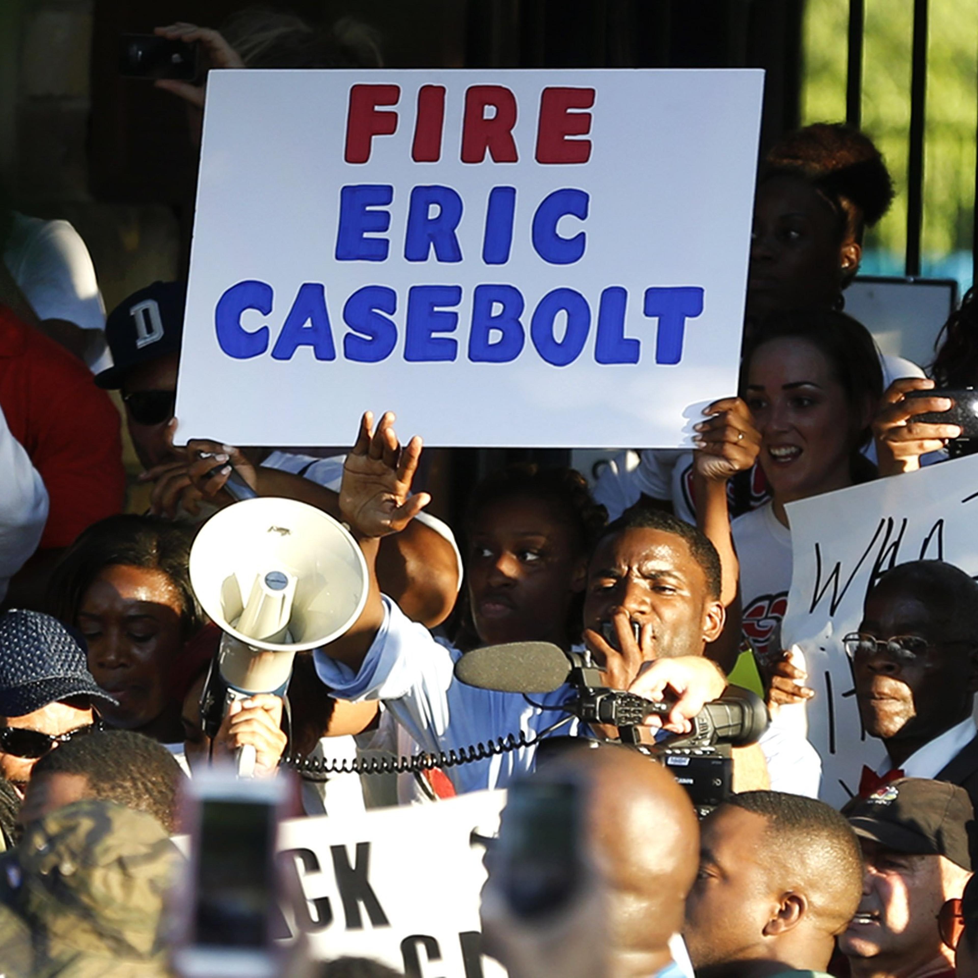 Demonstrators gather near a community pool on June 8, 2015, during a protest in response to an incident at the pool involving McKinney police officers in McKinney, Texas.