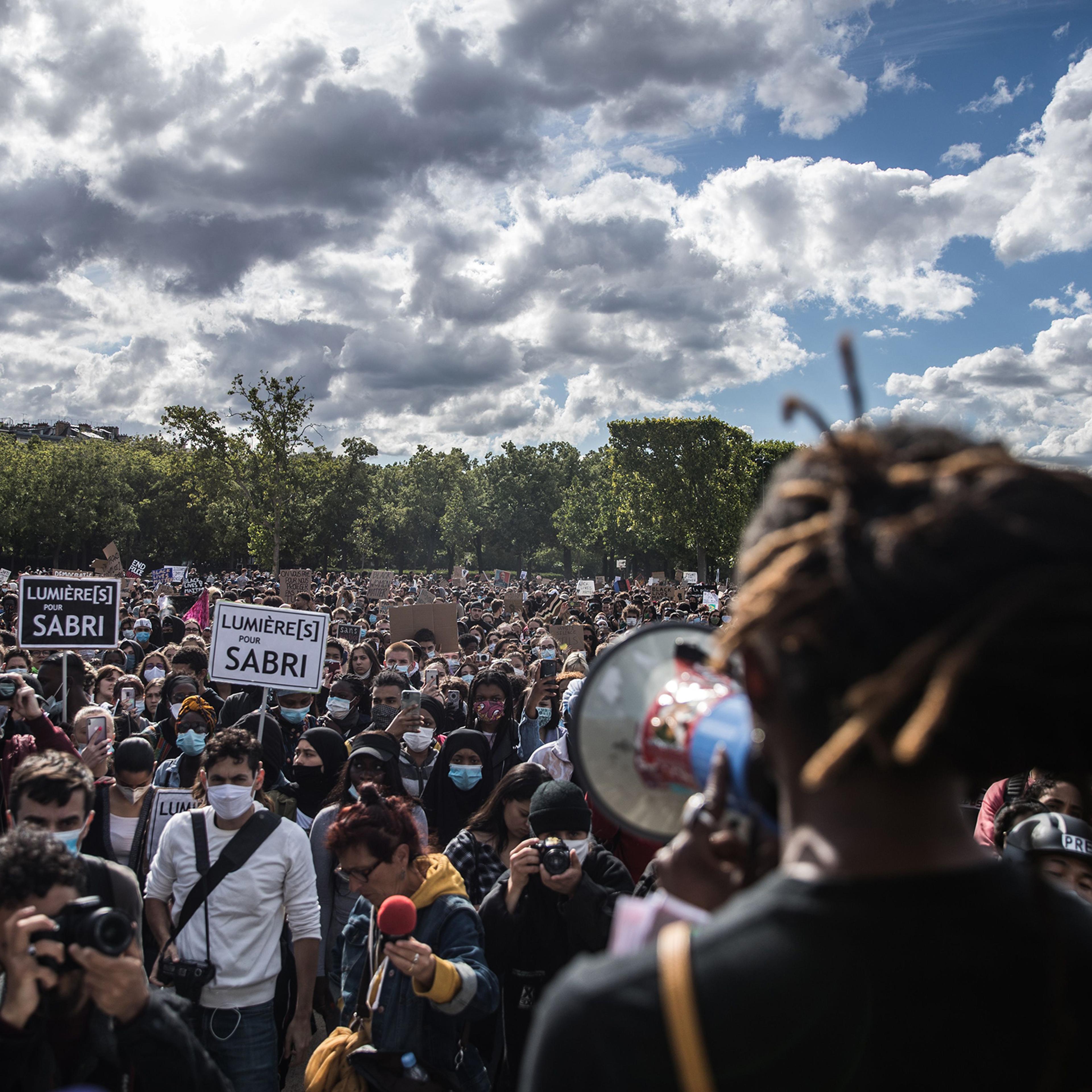 Protesters in Paris speak out on June 6 against police brutality in the U.S. and France