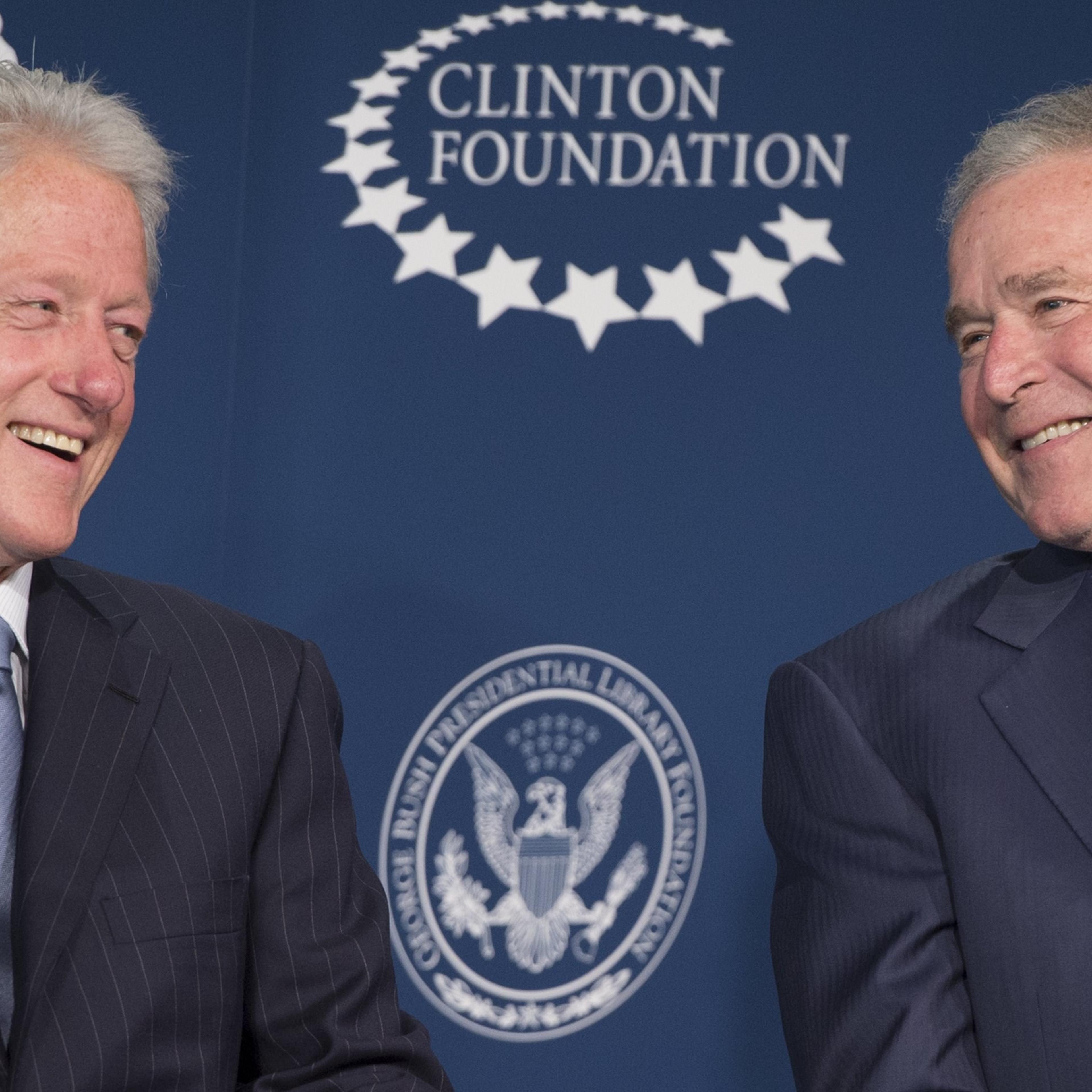 Former President Bill Clinton and former President George W. Bush speak during the launch of the Presidential Leadership Scholars Program at the Newseum in Washington on Sept. 8, 2014.