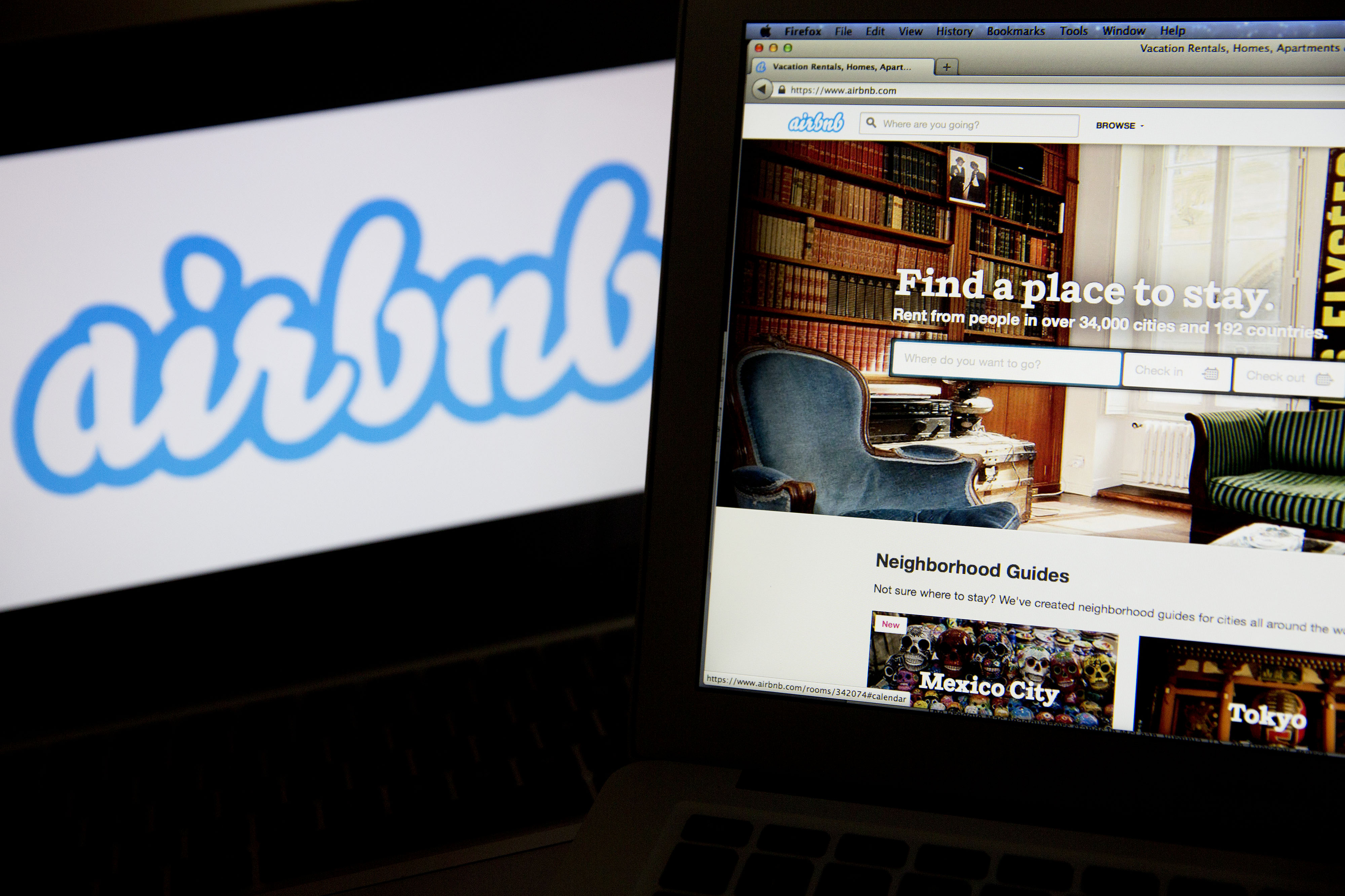 The Airbnb Inc. logo and website are displayed on laptop computers in this arranged photograph in Washington, D.C., U.S., on Friday, March 21, 2014.