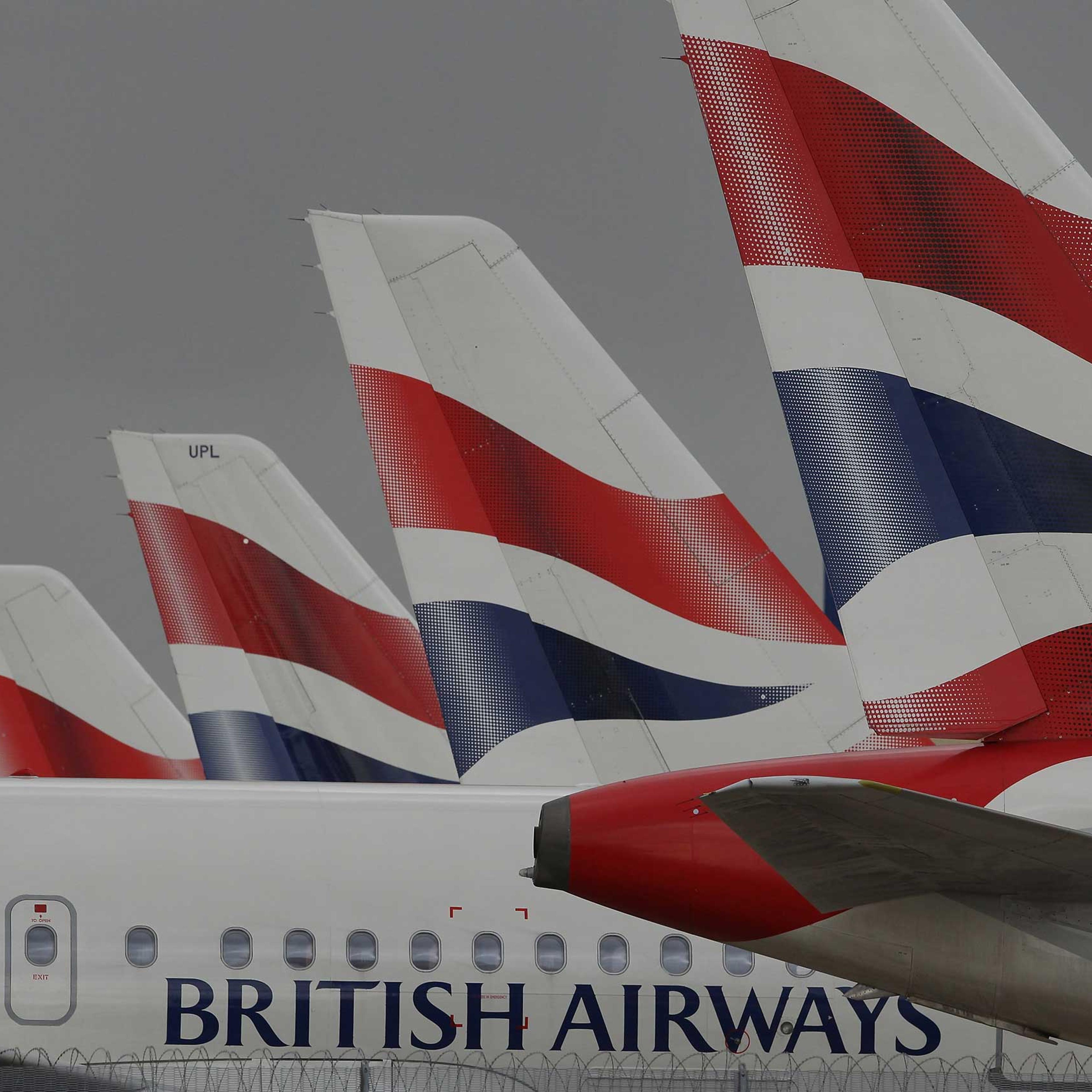 British Airways aircraft are parked on an apron at Heathrow airport during the first day of a strike by cabin crew on March 27, 2010 in London.