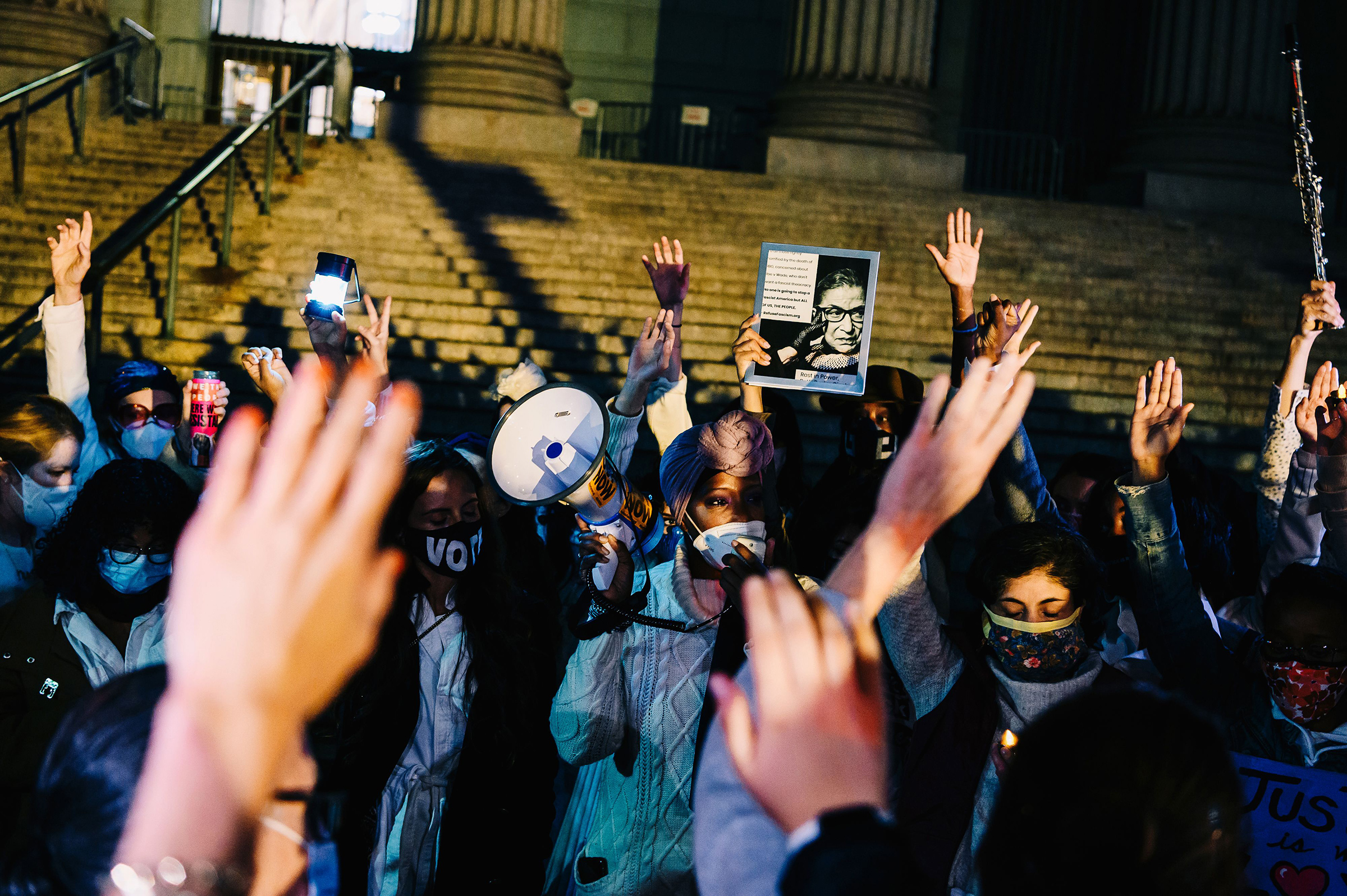 Mourners gather for a candlelight vigil to pay their respects to Supreme Court Justice Ruth Bader Ginsburg, who died a day earlier, at a Manhattan courthouse on Sept. 19, 2020.