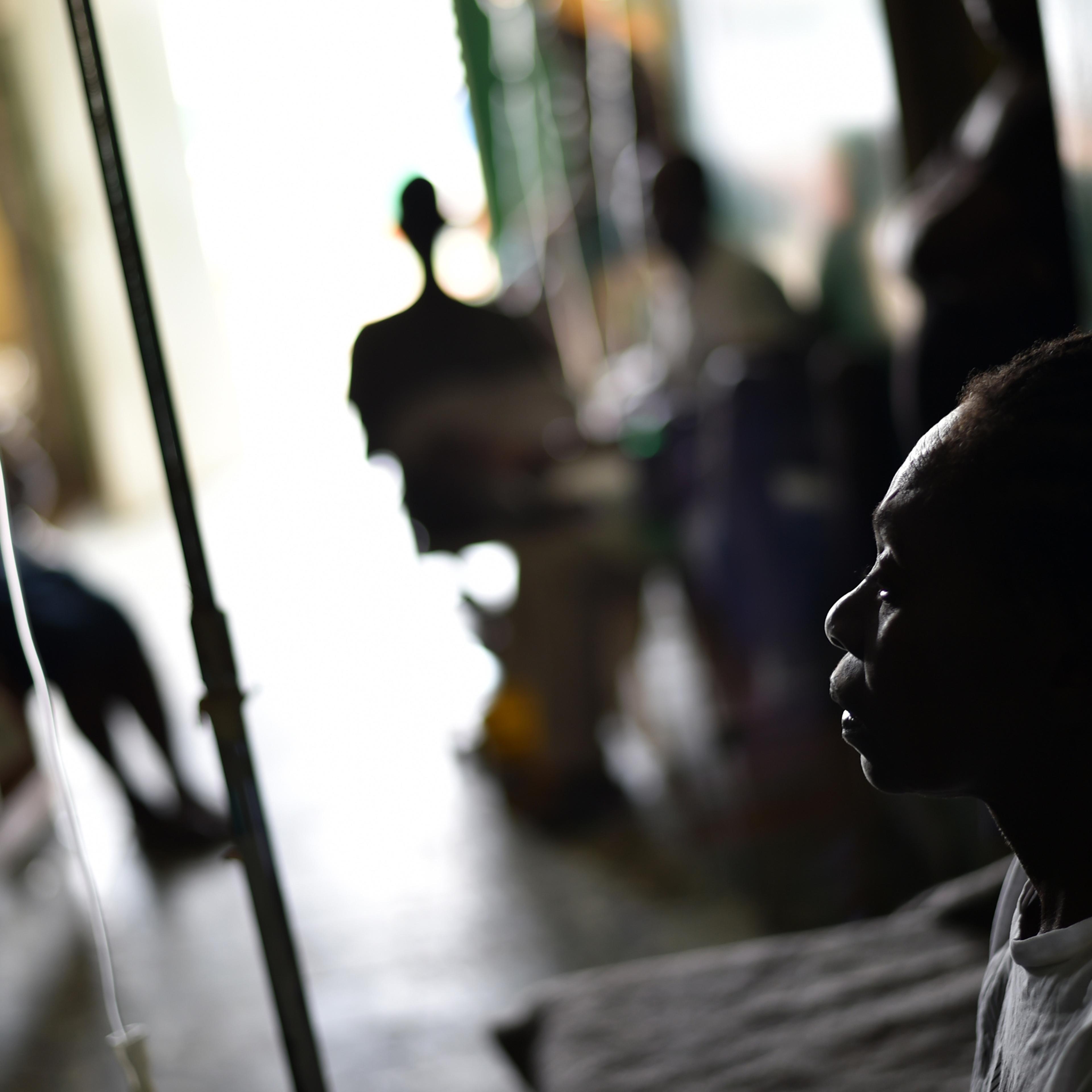 Toussaint, patient with cholera symptoms, receives medical attention at the health center of Les Anglais, in Les Cayes in the southwest of Haiti on Oct. 16, 2016.