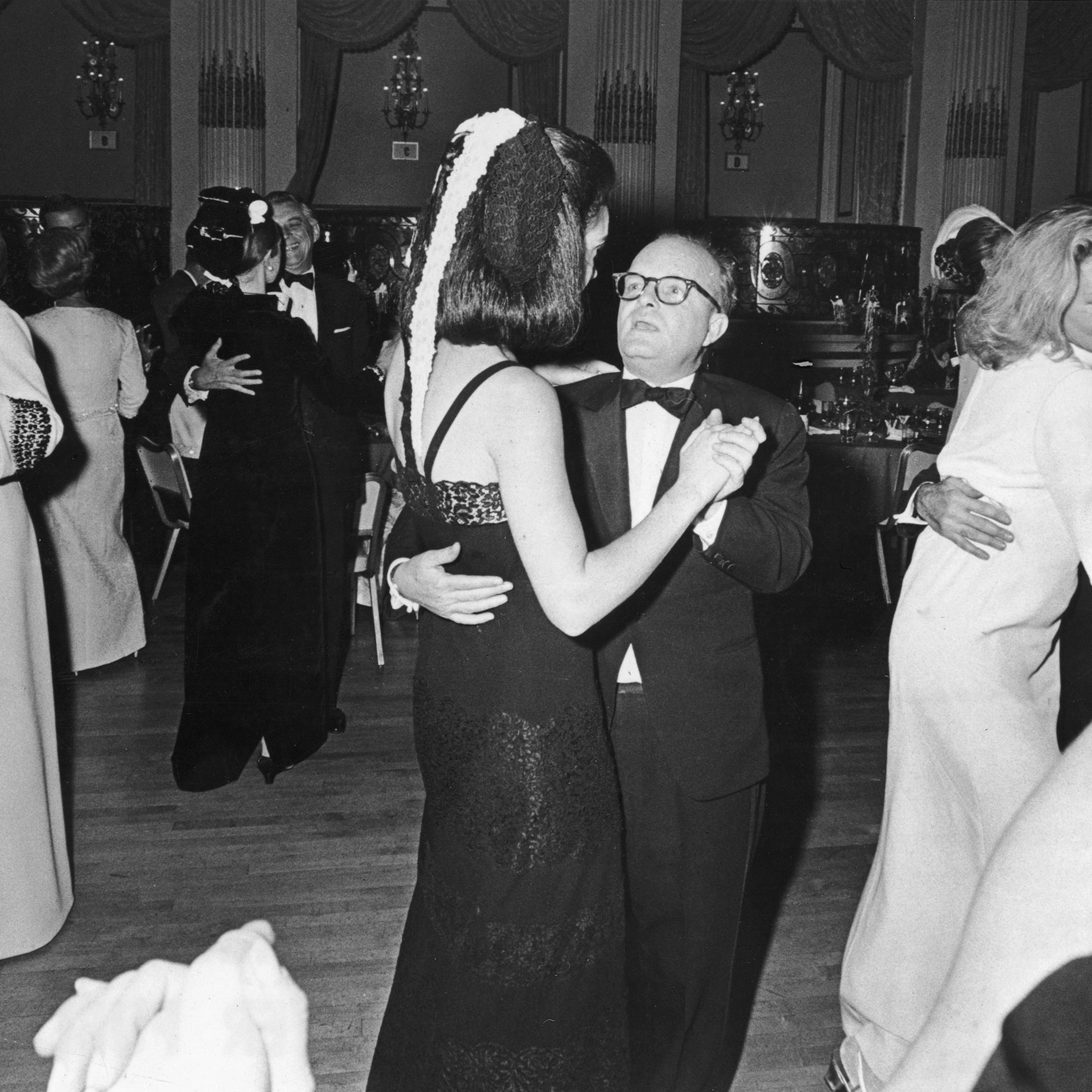 Truman Capote, Wendy Vanderbilt, Katherine Graham, and Lauren Bacall dance at Capote’s Black and White Ball