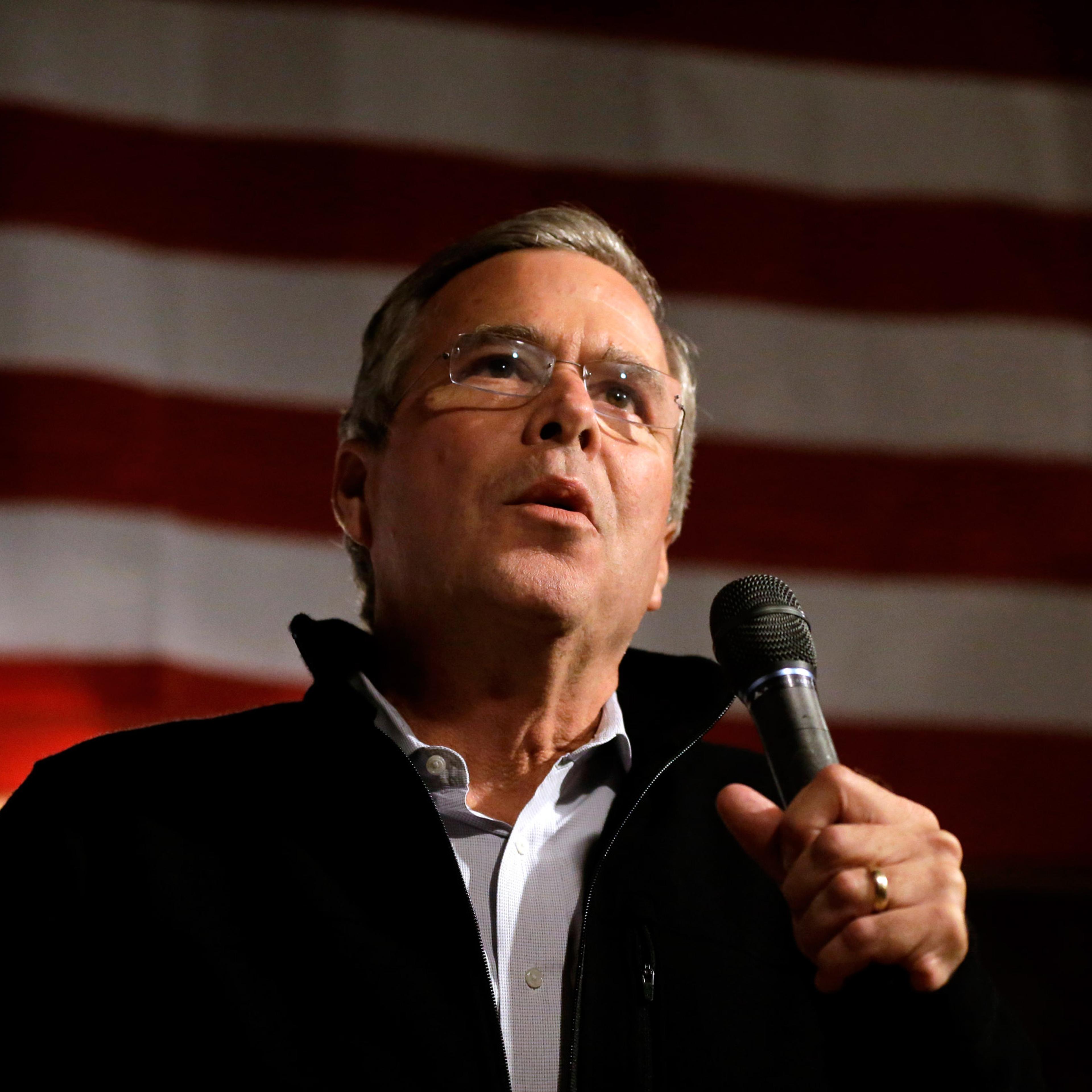 Republican presidential candidate, former Florida Gov. Jeb Bush, addresses an audience at a campaign event held in a barn belonging to former Sen. Scott Brown, R-Mass., Tuesday, Nov. 3, 2015, in Rye, N.H. (AP Photo/Steven Senne)
